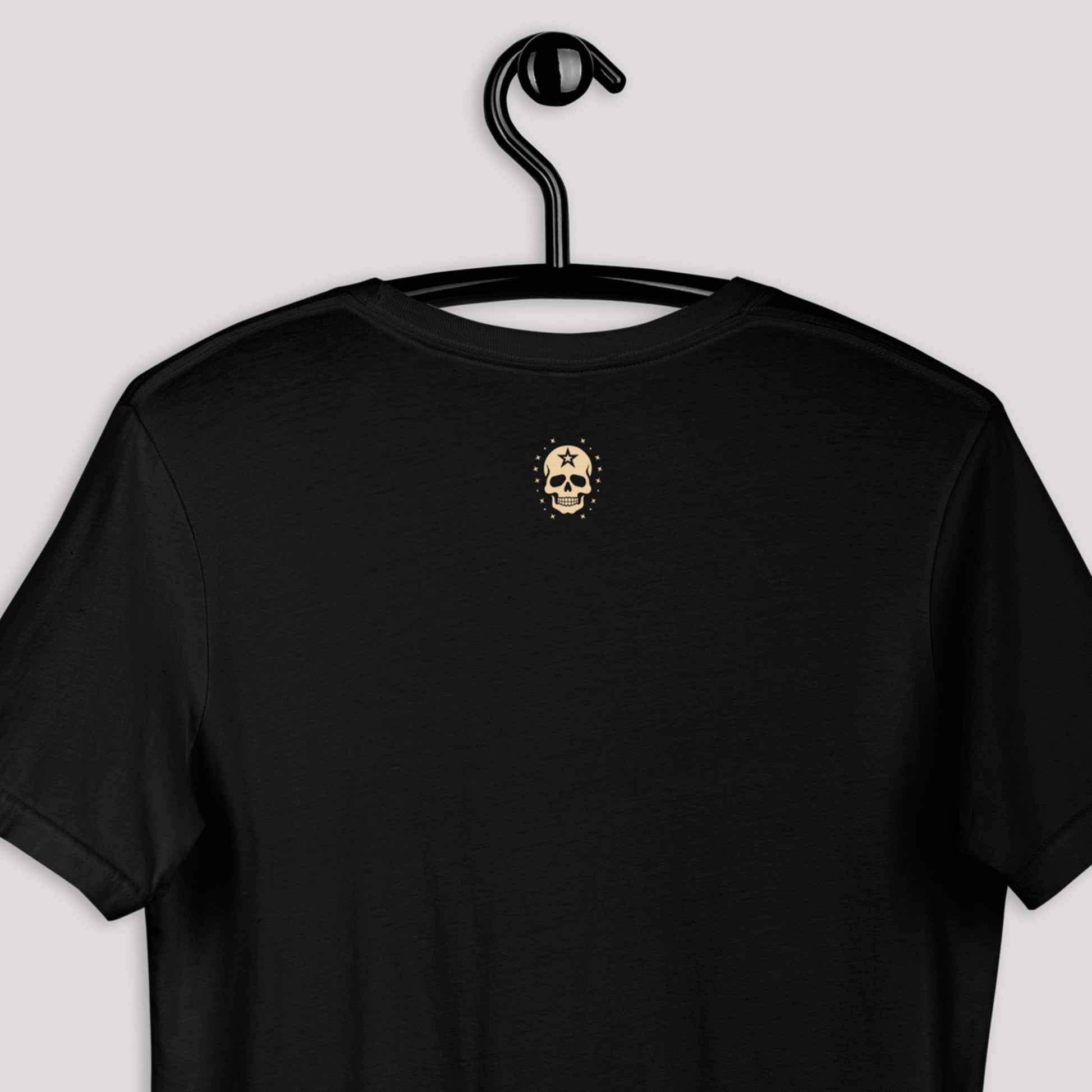 closeup of back view of black Anchor's Tale Unisex t-shirt displayed on a hanger