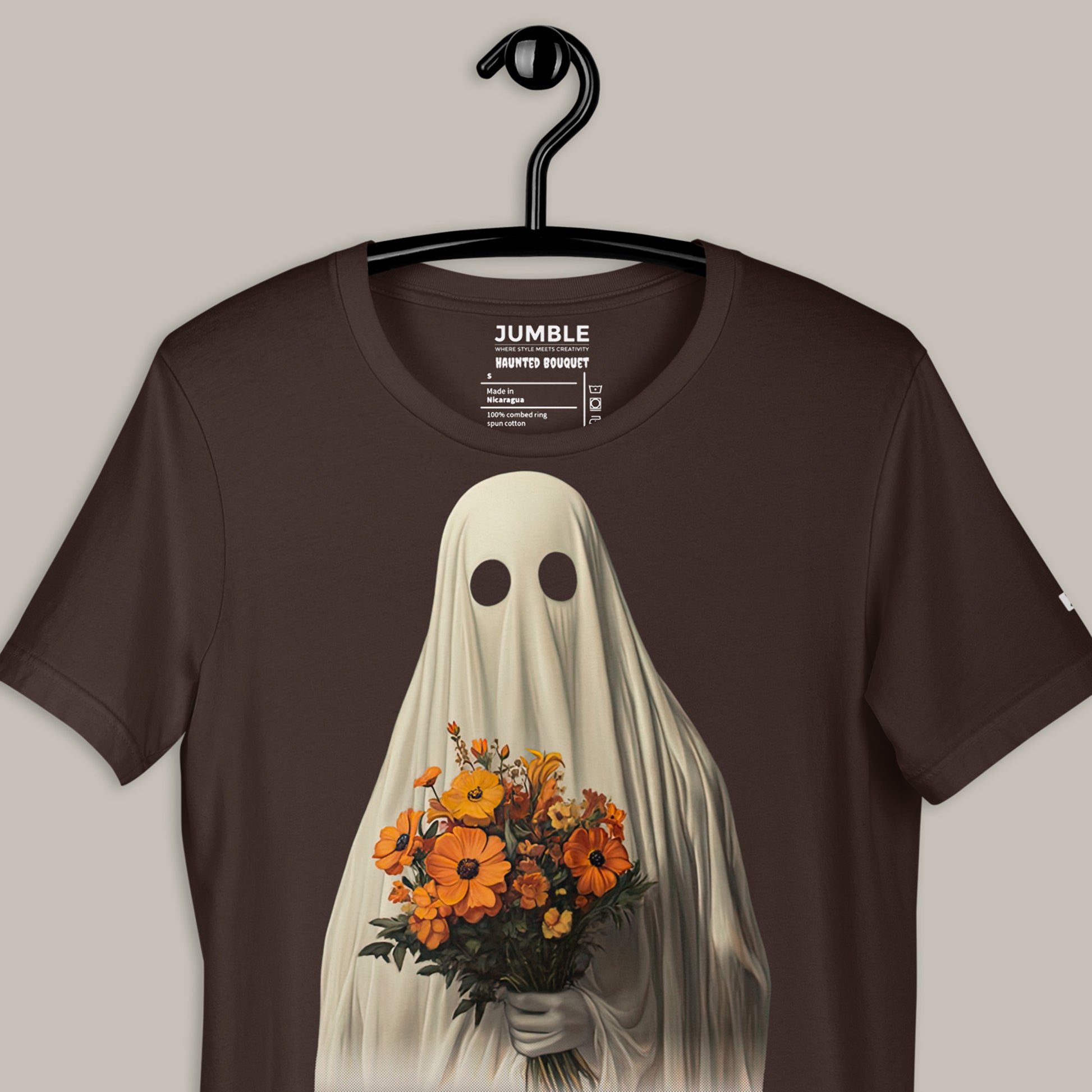 closeup of brown Haunted Bouquet Unisex t-shirt  on a hanger