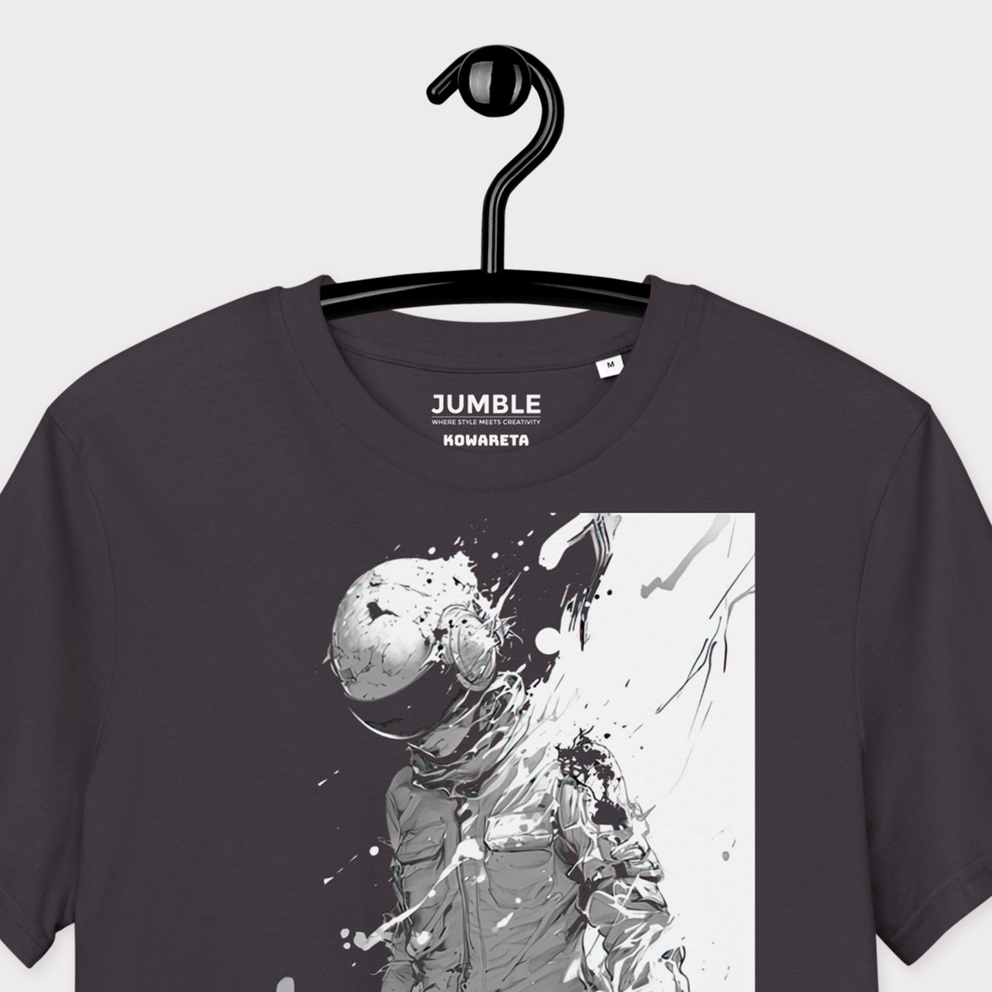 closeup of anthracite Kowareta Premium Unisex organic cotton t-shirt on a hanger