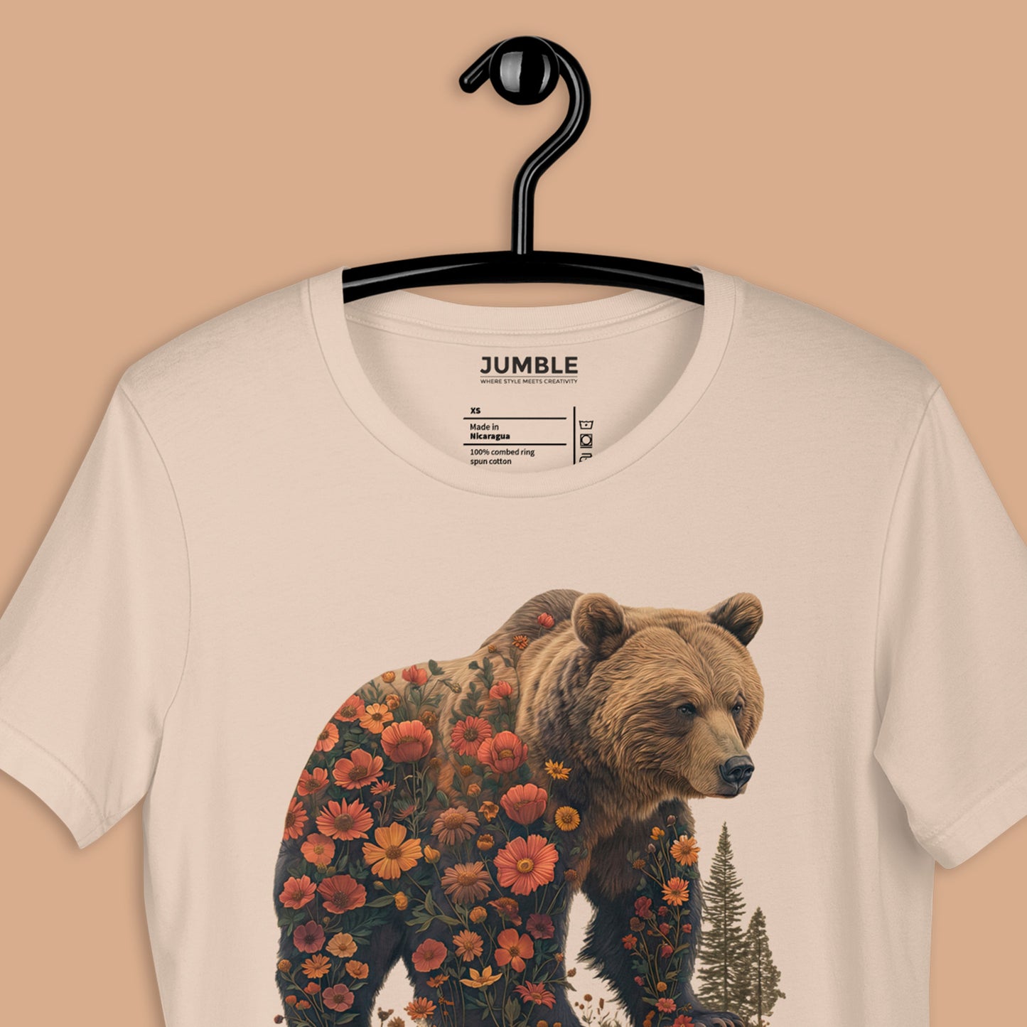 closeup of soft cream Wildflowered Bruin Unisex t-shirt on a hanger