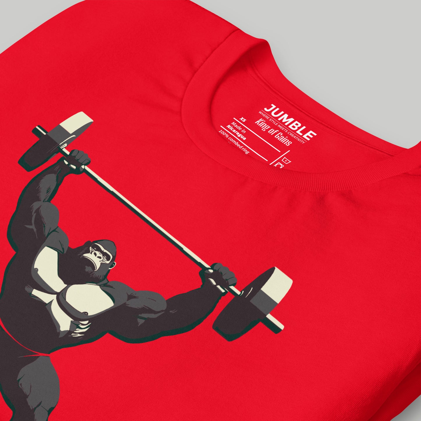 closeup of folded King of Gains Unisex t-shirt