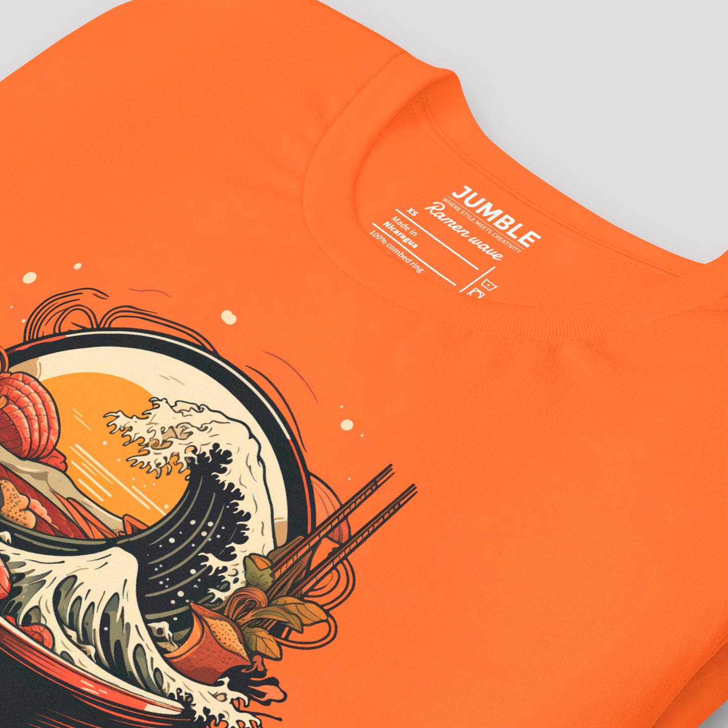 closeup of Ramen Wave Unisex t-shirt in orange