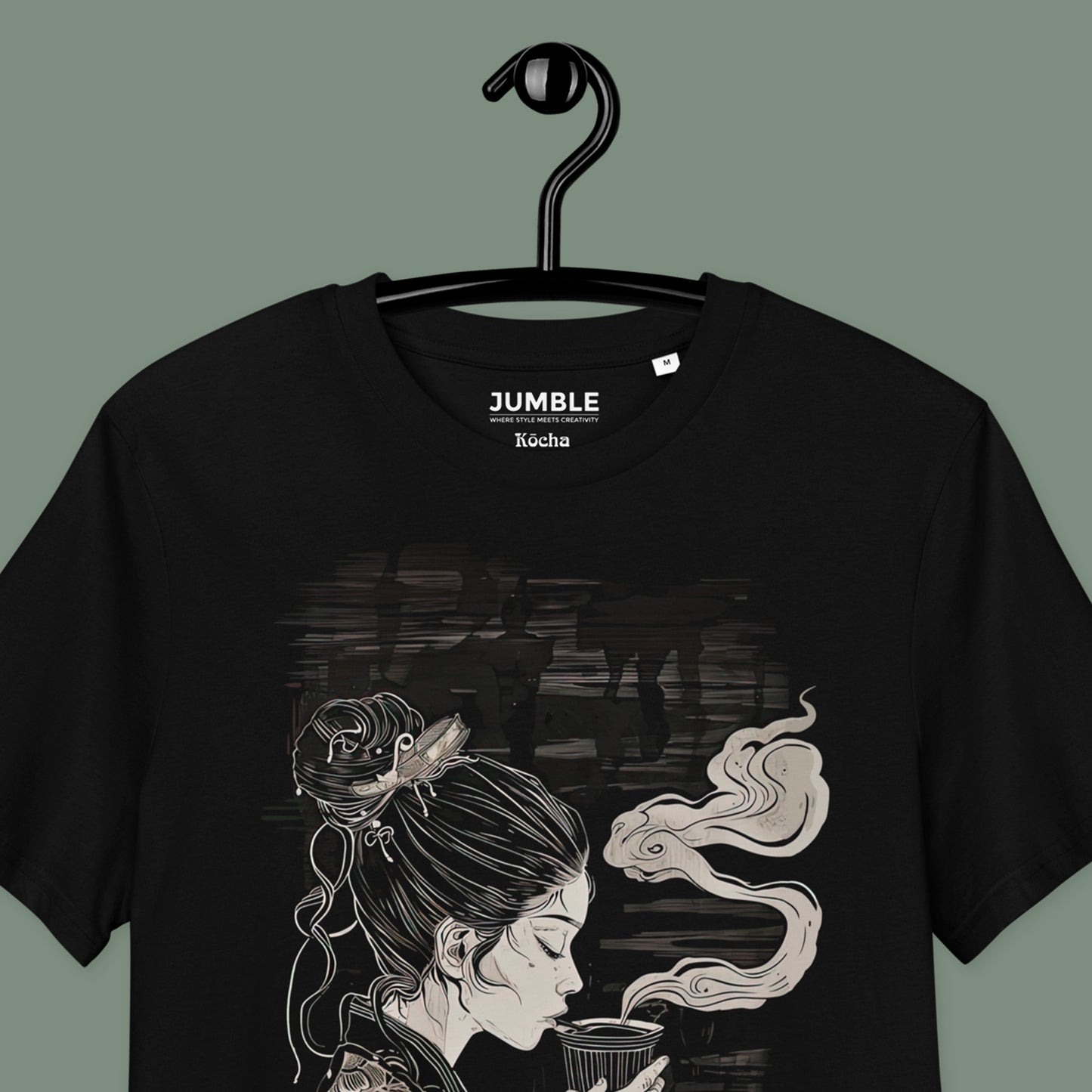 closeup of Kōcha Premium Unisex organic cotton t-shirt on a hanger