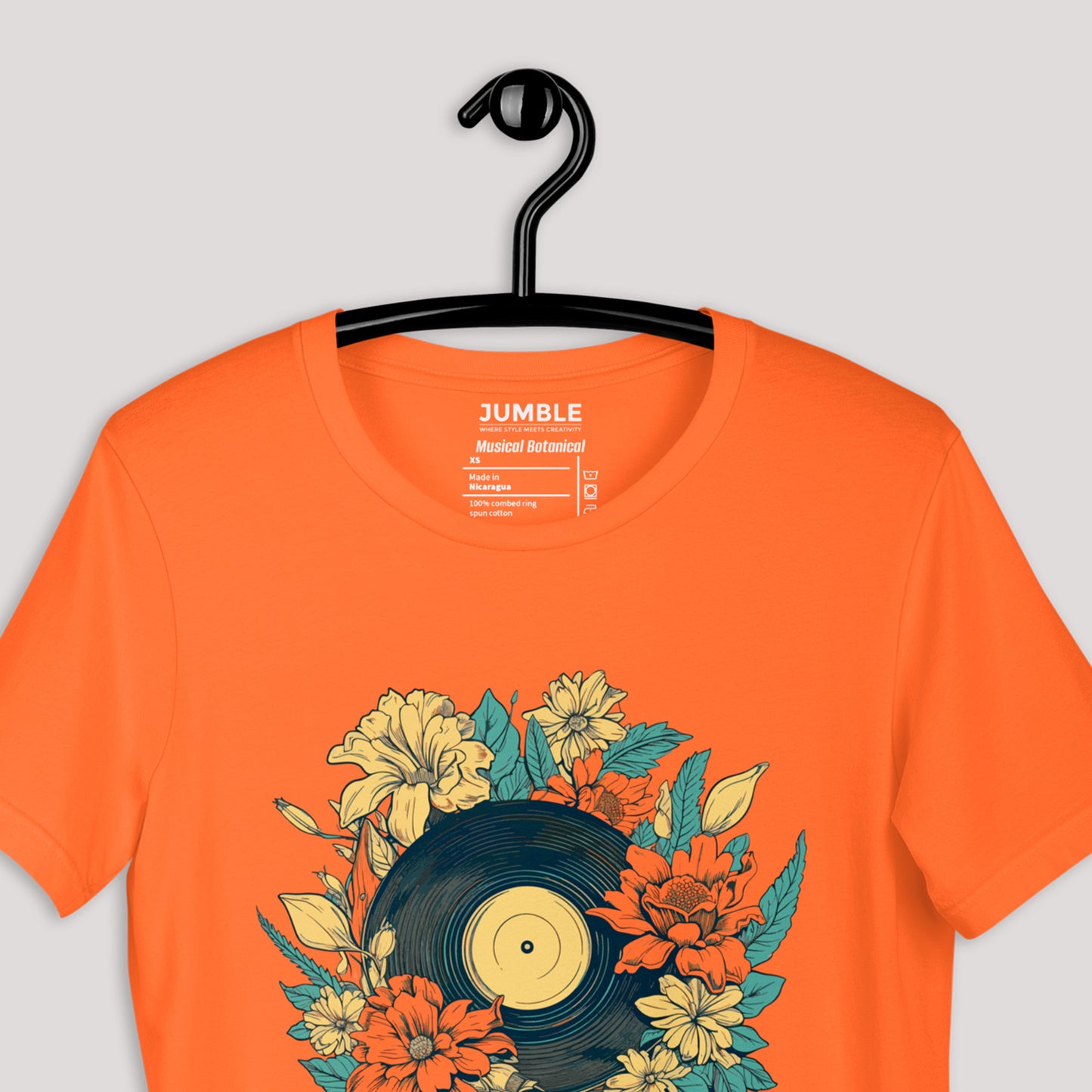 closeup of Musical Botanical Unisex t-shirt on hanger