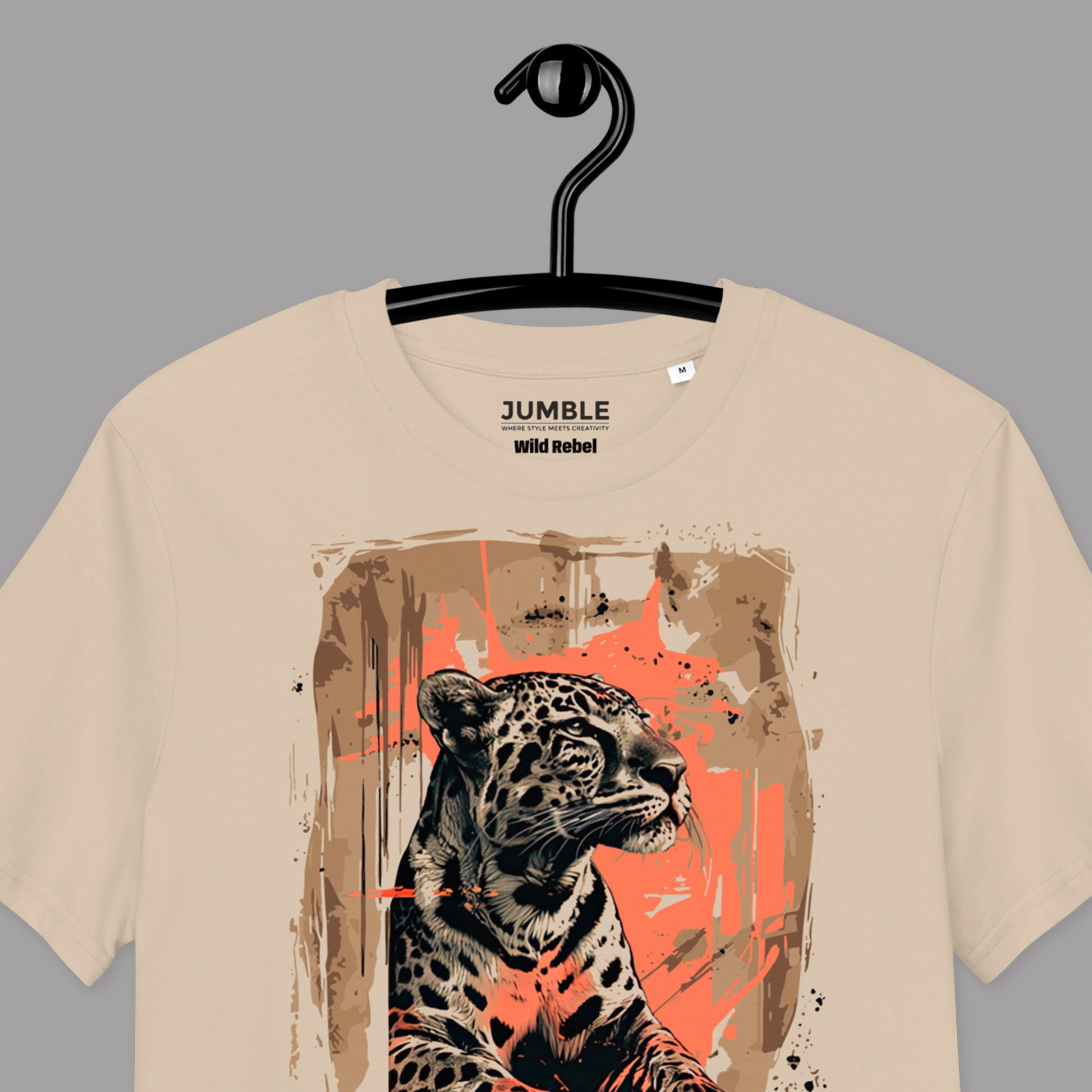 closeup of Wild Rebel Premium Unisex organic cotton t-shirt on a hanger
