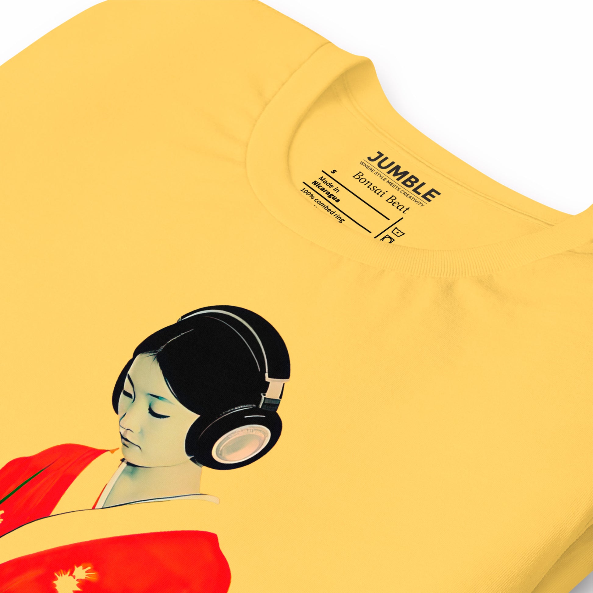 closeup of folded yellow Bonsai Beat Unisex t-shirt