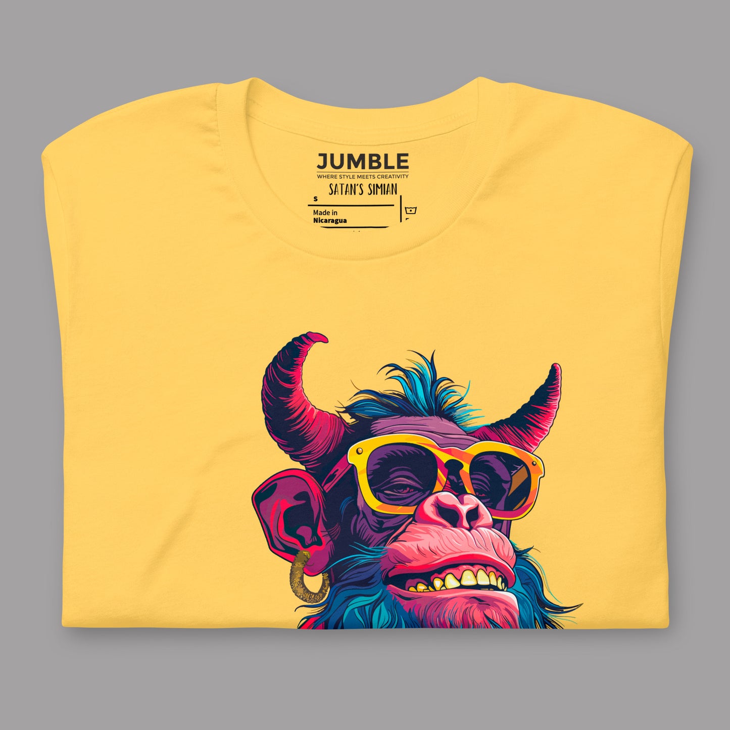 folded yellow Satan's Simian Unisex t-shirt