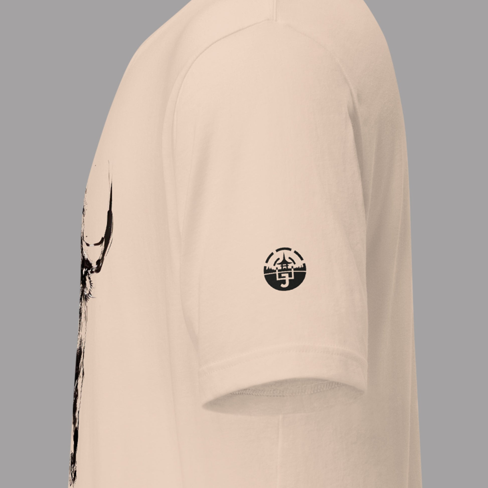 sleeve logo on a cream Gyūei Unisex t-shirt