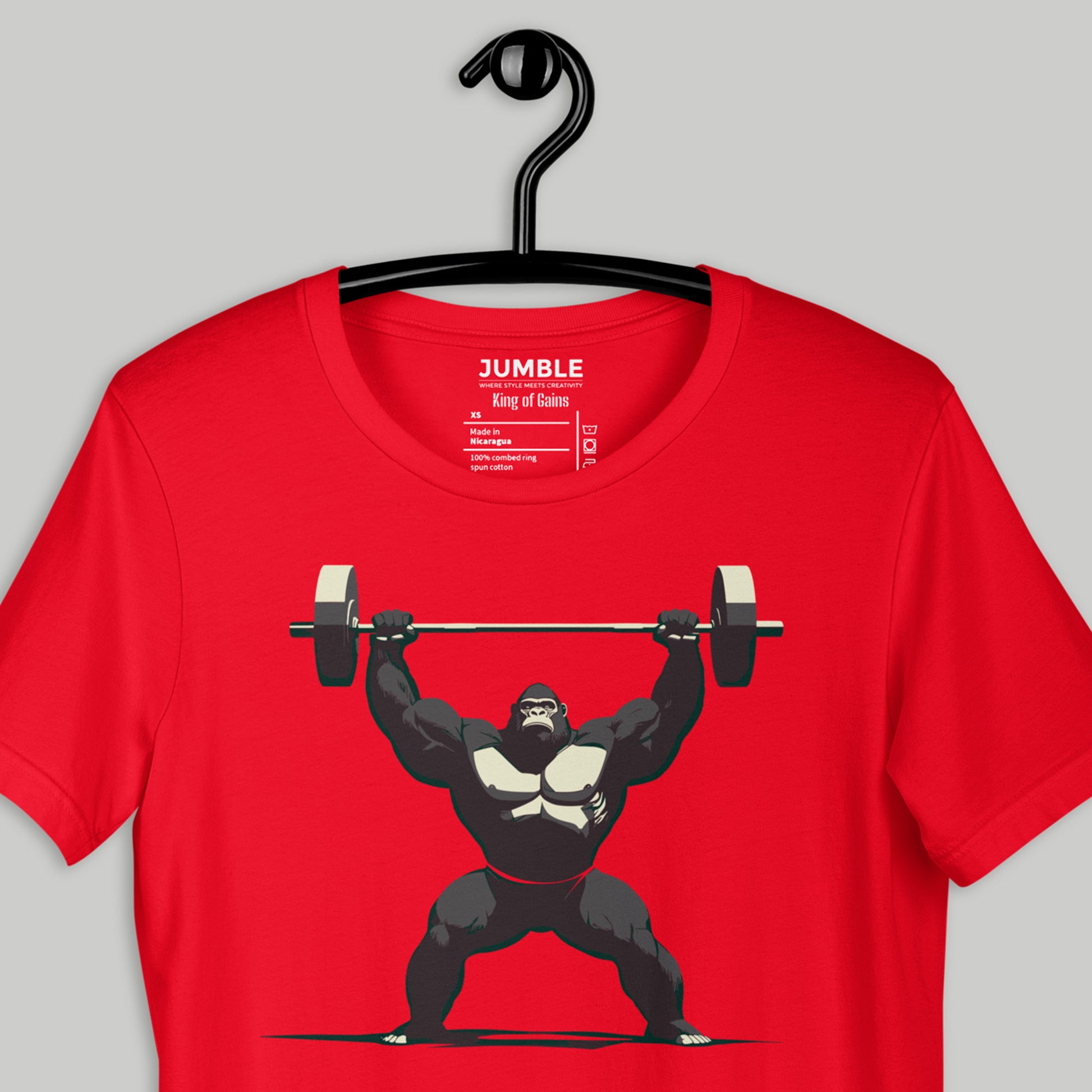 closeup of King of Gains Unisex t-shirt on hanger