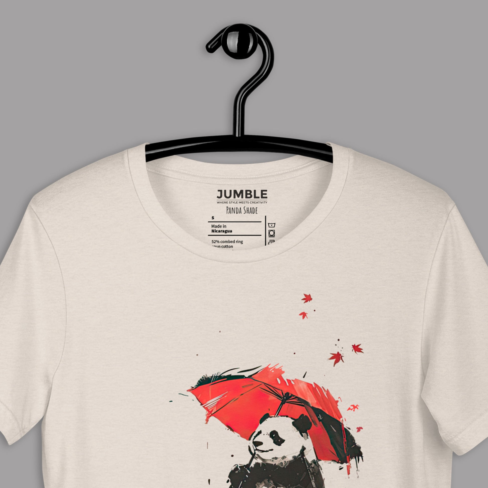 closeup of heather dust Panda Shade Unisex t-shirt  on hanger