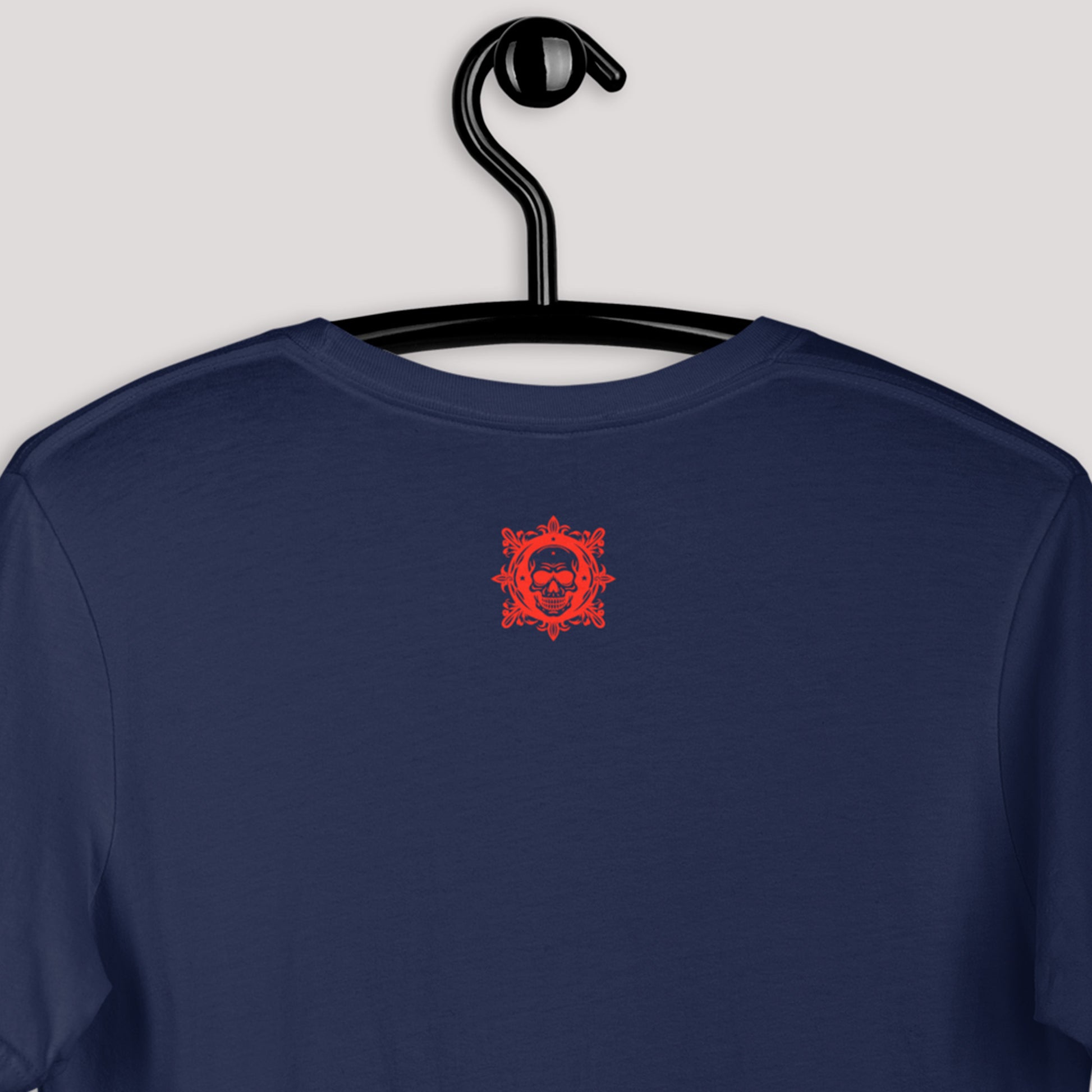 closeup of skull icon on back of Sailor's Bite Unisex t-shirt