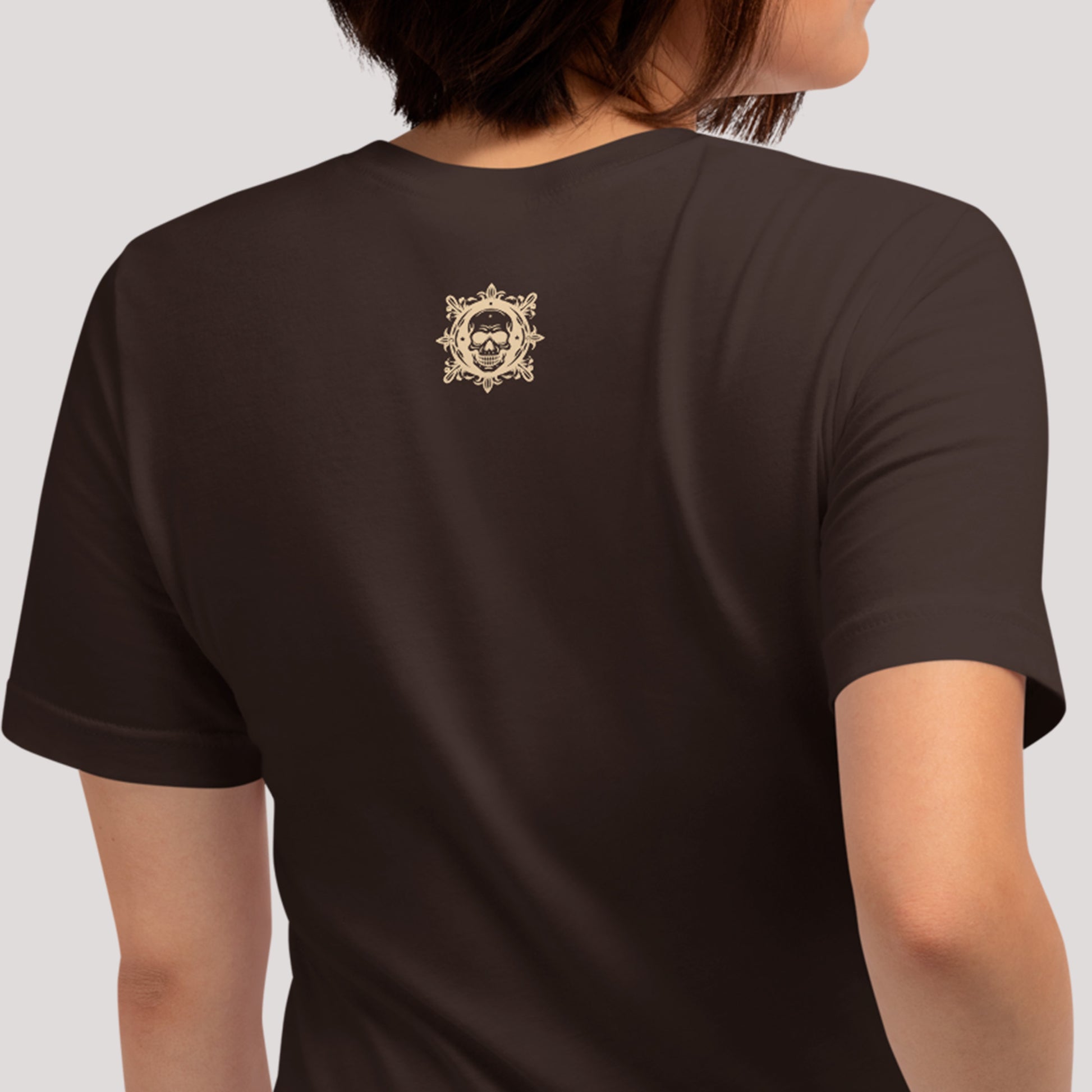 back view of model wearing brown Coiled Grace Unisex t-shirt