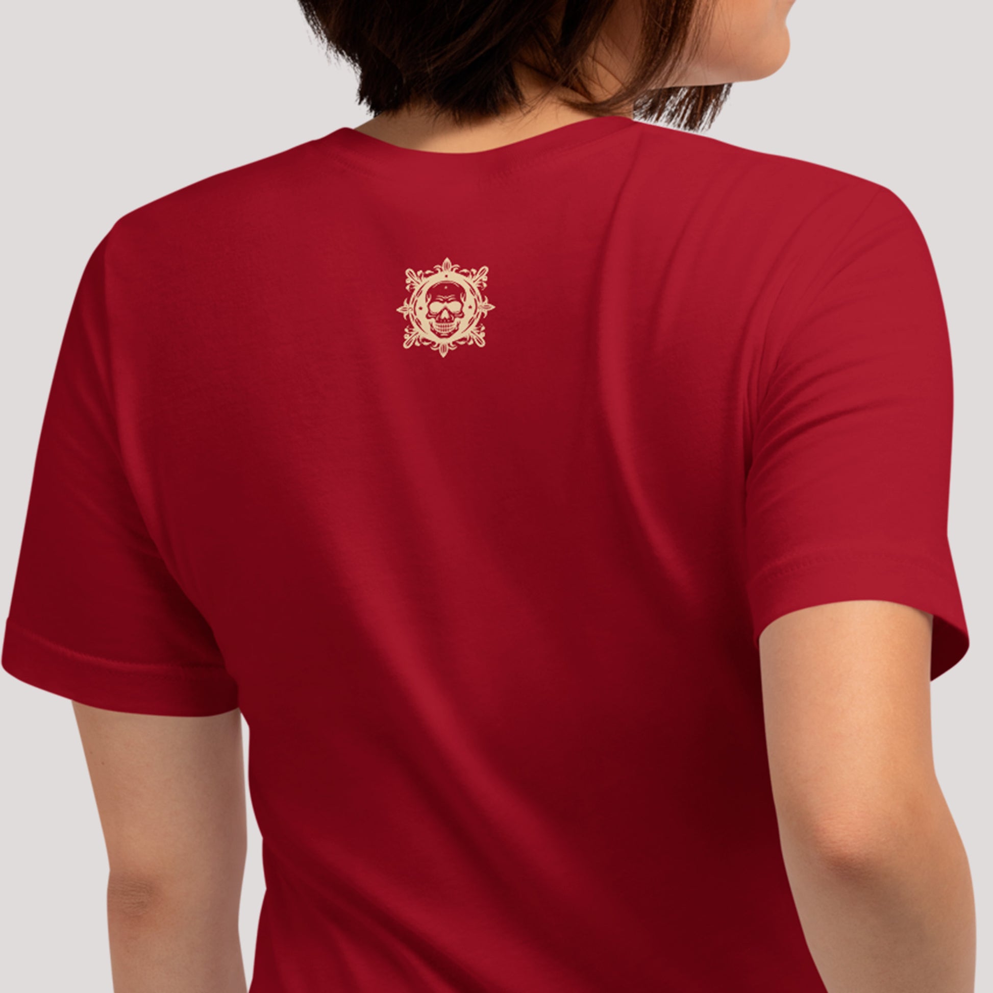 back view of model wearing cardinal Coiled Grace Unisex t-shirt