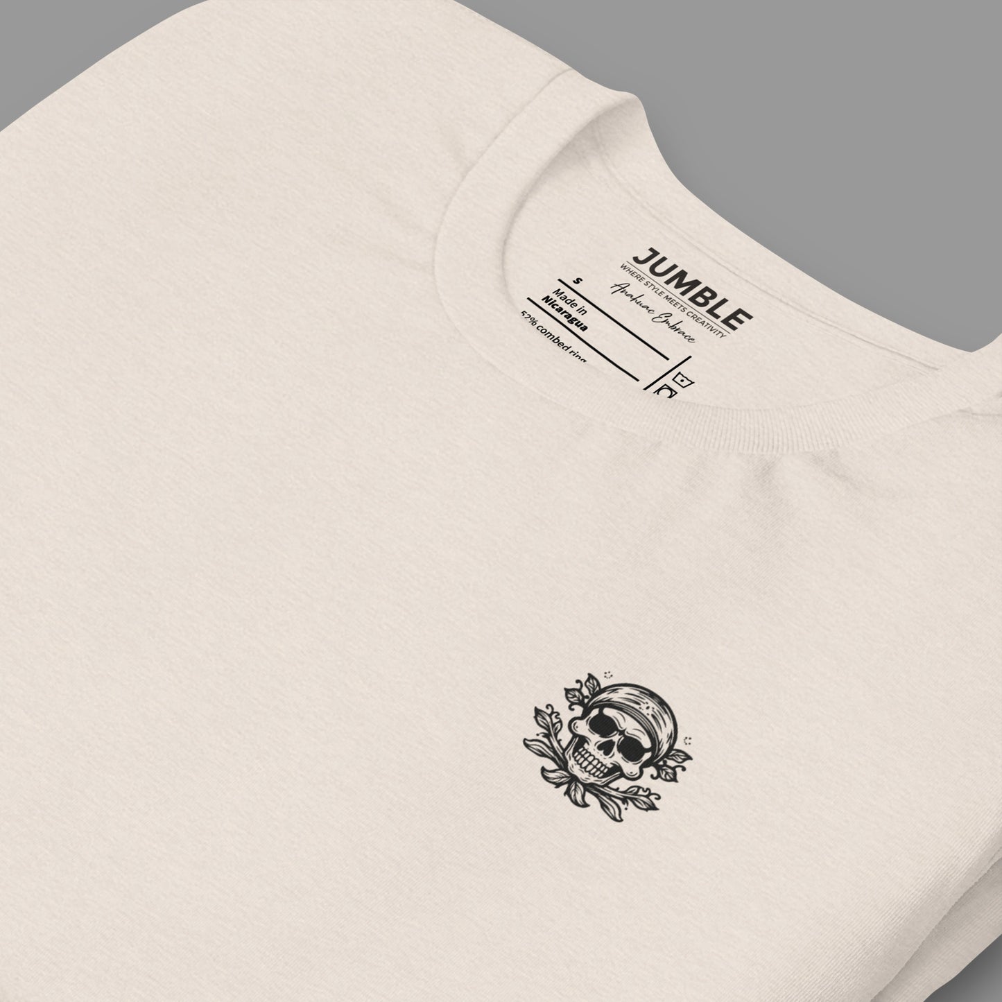 closeup of folded Anahuac Embrace Unisex t-shirt displayed on an angle