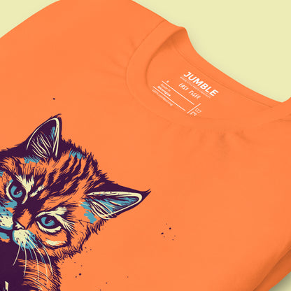 close up of folded burnt orange Easy Tiger Unisex t-shirt