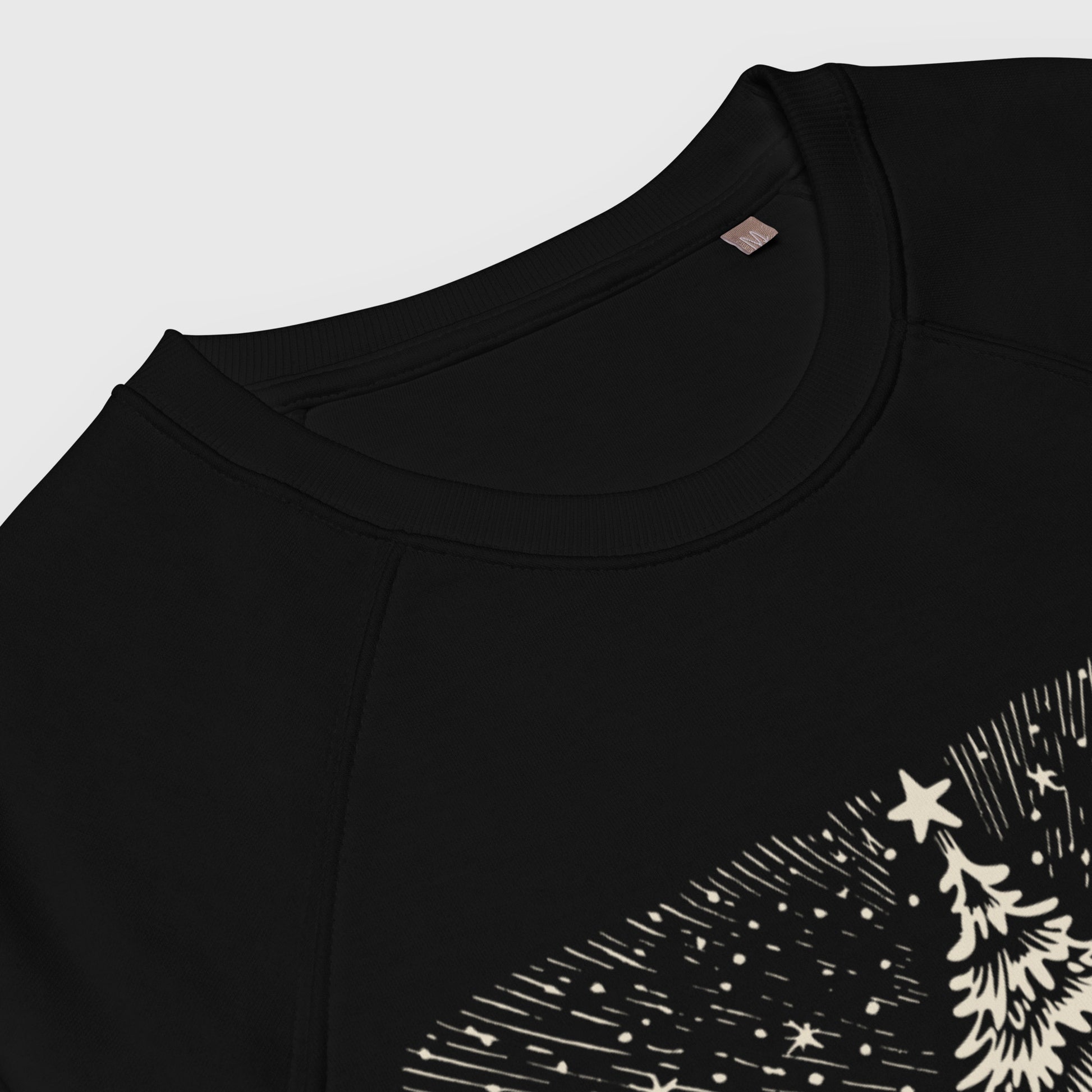 collar detail on Chiaroscuro Christmas Unisex organic raglan sweatshirt
