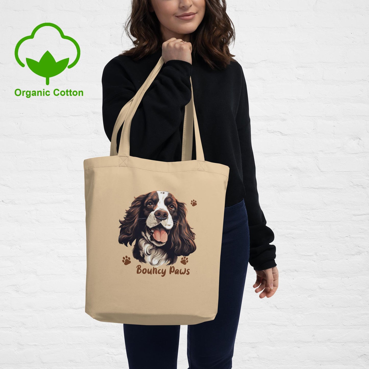 Bouncy Paws Eco Tote Bag in Oyster, held by mode