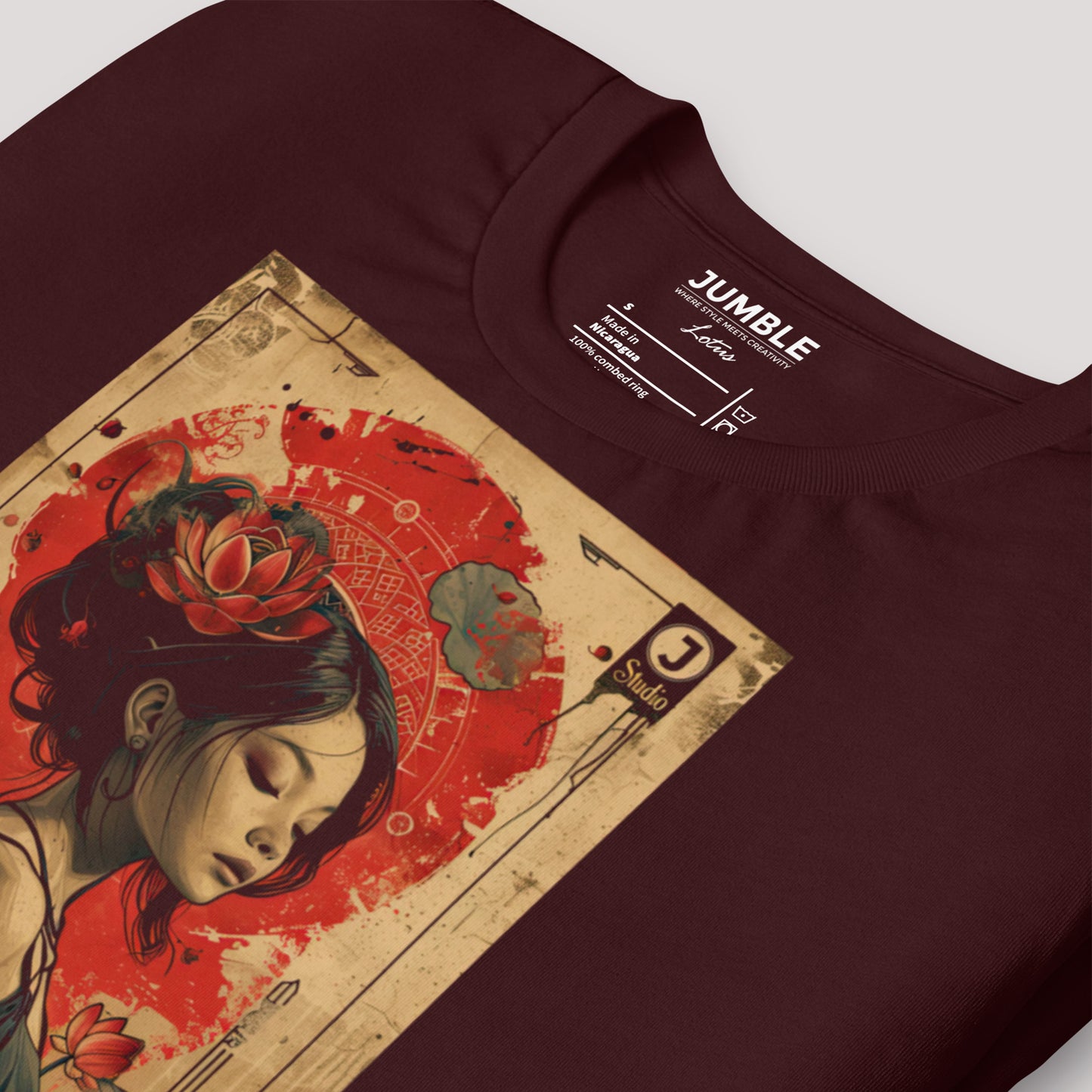 closeup of folded oxblood Lotus Unisex t-shirt