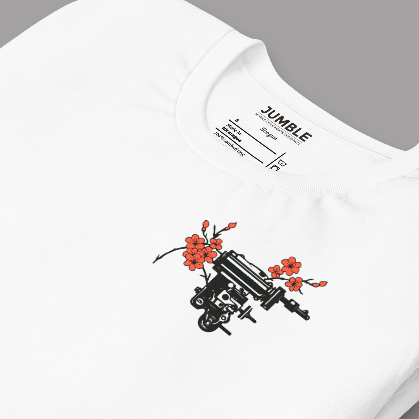 folded white Shogun Unisex t-shirt on an angle