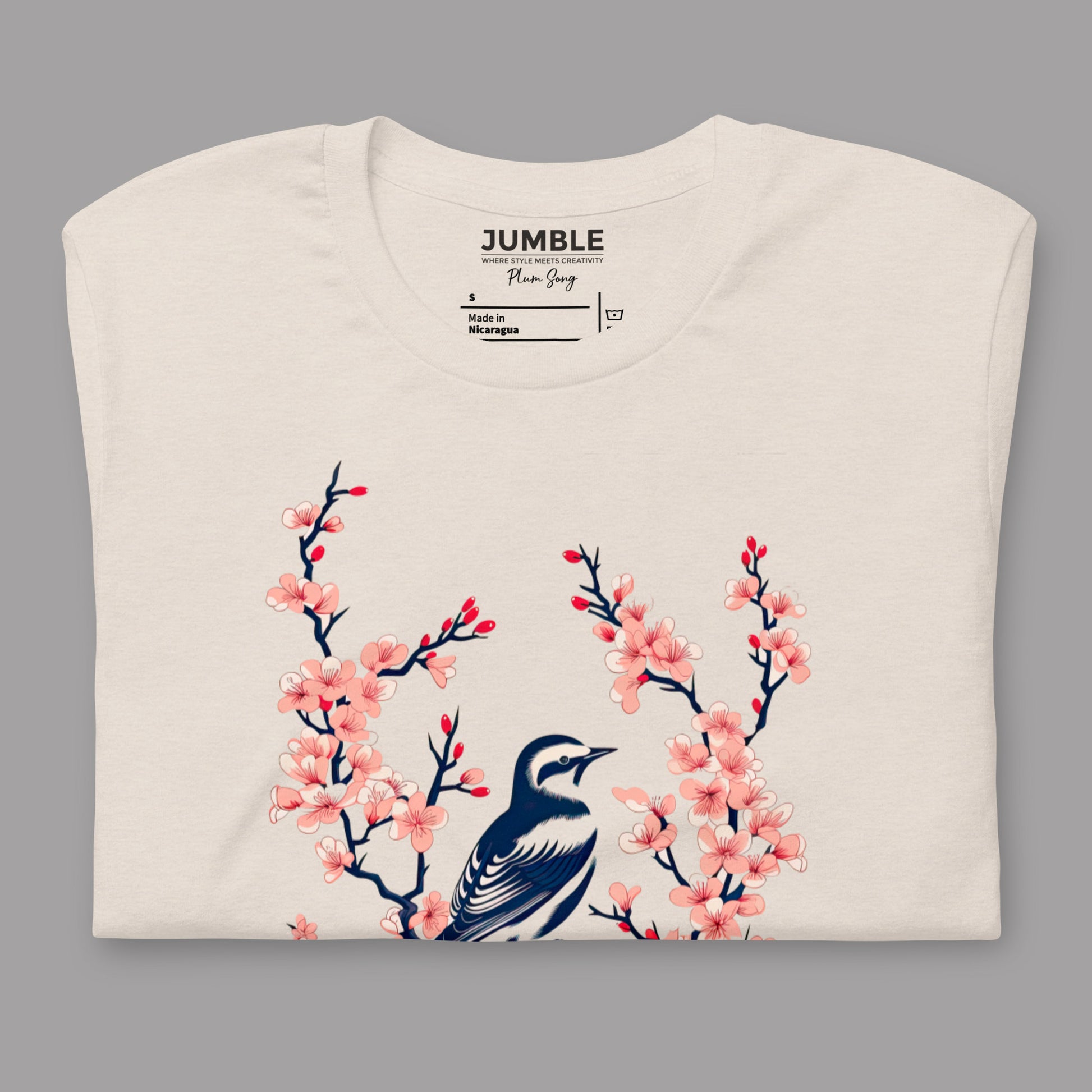 closeup of folded Plum Song Unisex t-shirt