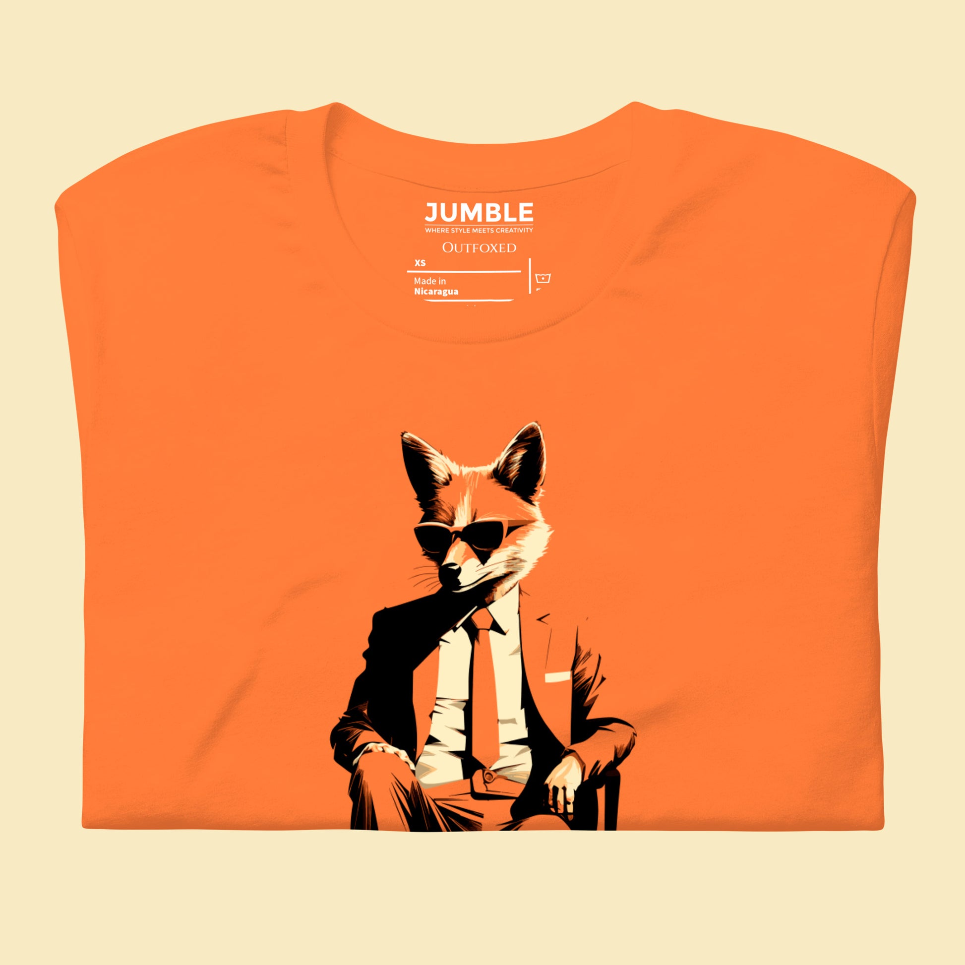 folded burnt orange Outfoxed  Unisex t-shirt