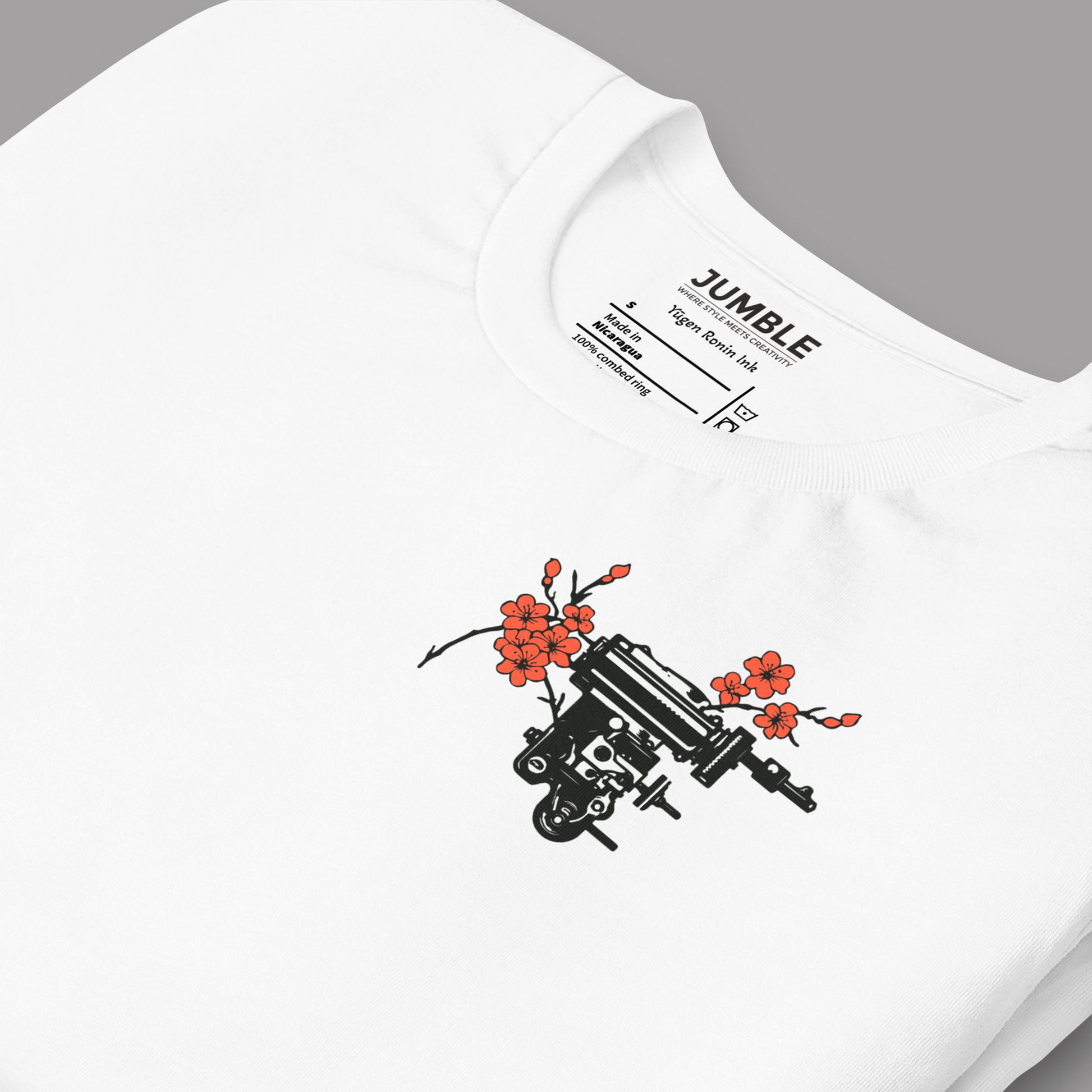 closeup of folded Yūgen Ronin Ink Unisex t-shirt displayed on and angle