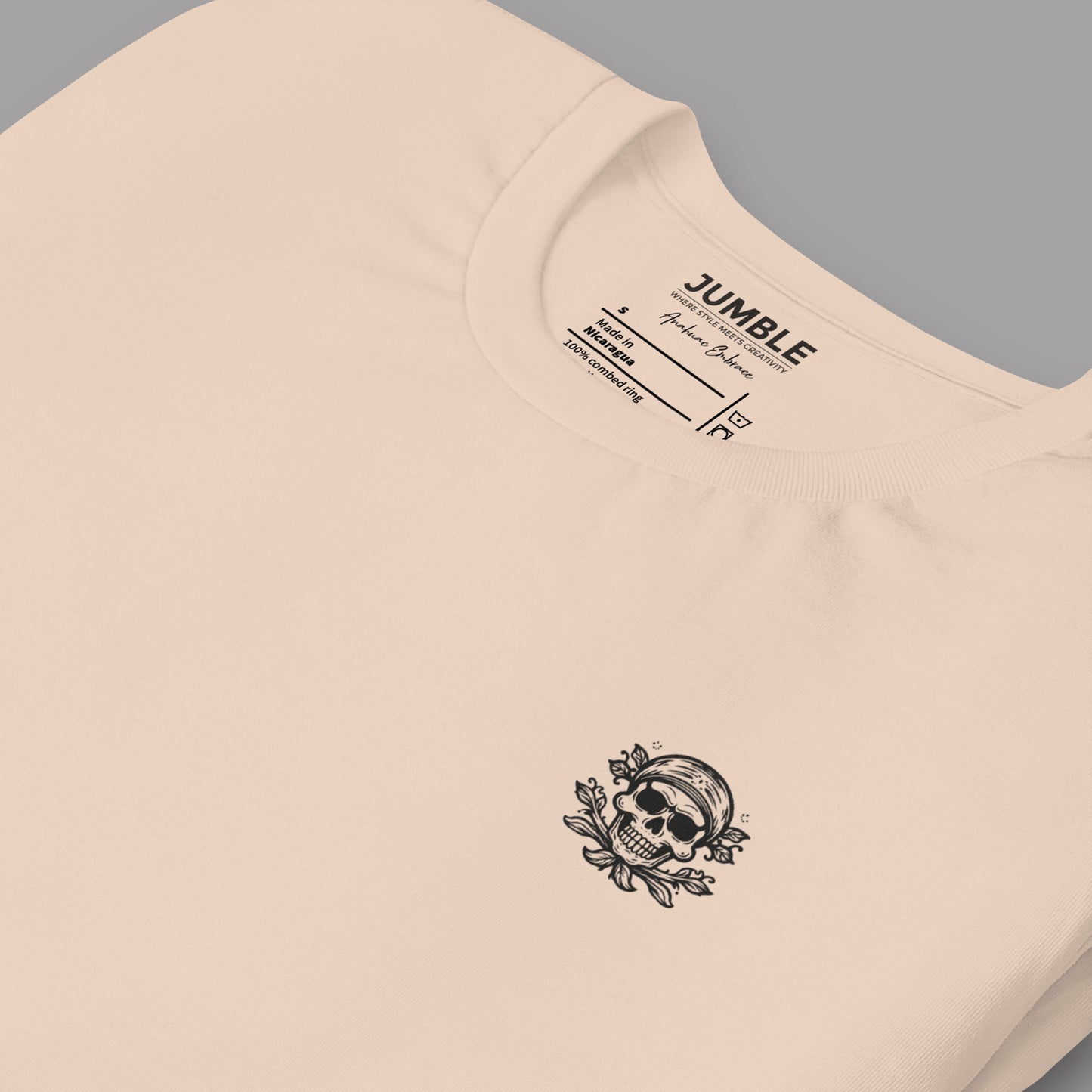 closeup of a folded soft cream Bayou Mystique Unisex t-shirt
