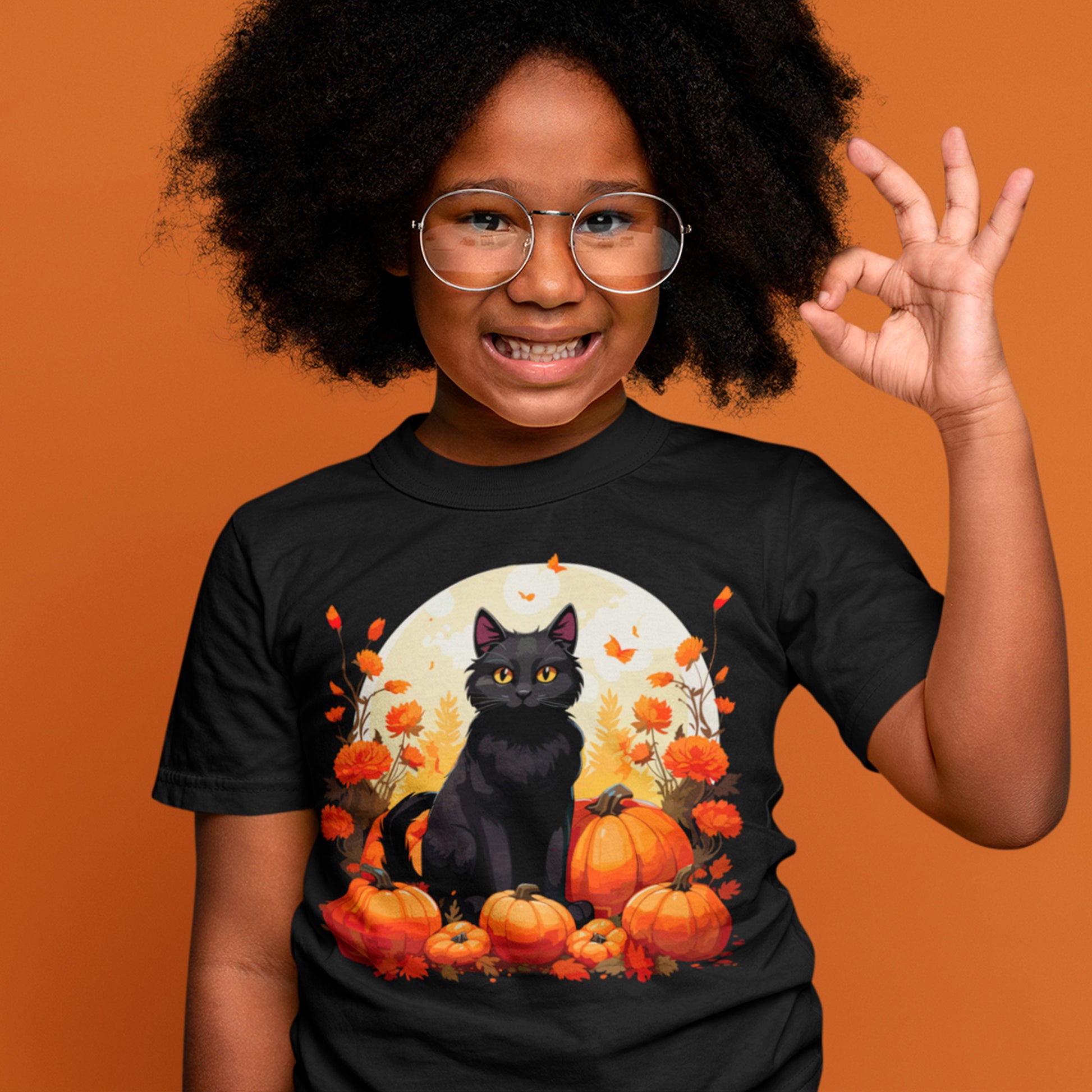 girl wearing black Whiskers and Gourds Organic cotton kids t-shirt