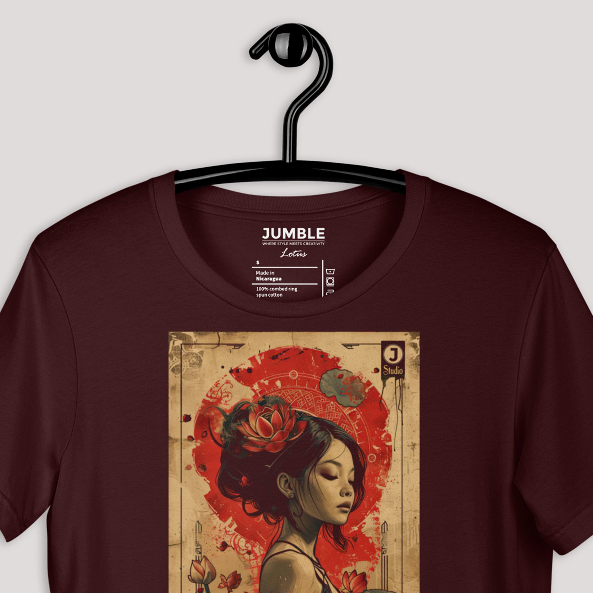 closeup of oxblood Lotus Unisex t-shirt on a hanger