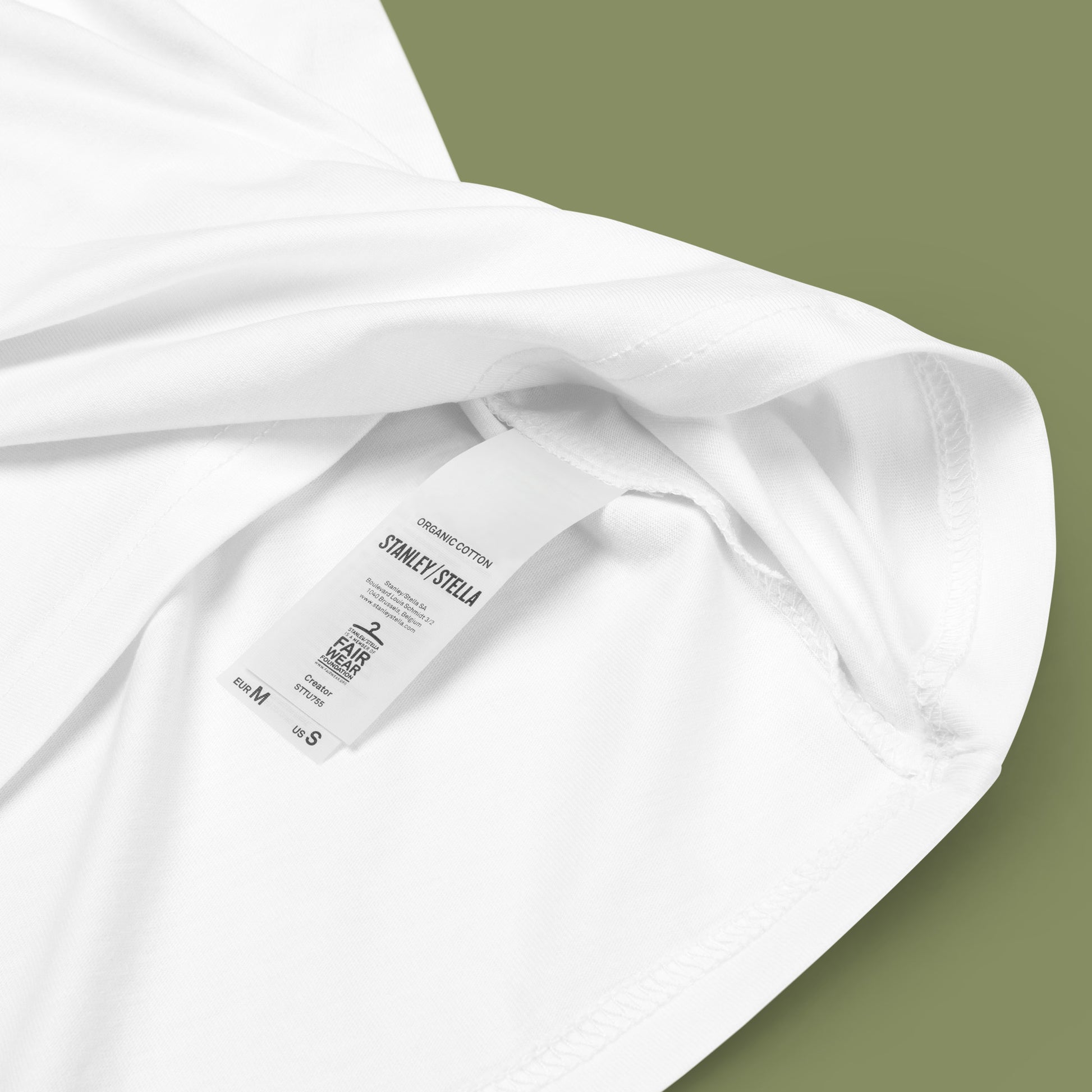 closeup of organic cotton label on a white xFerocious Freedom Unisex organic cotton t-shirt
