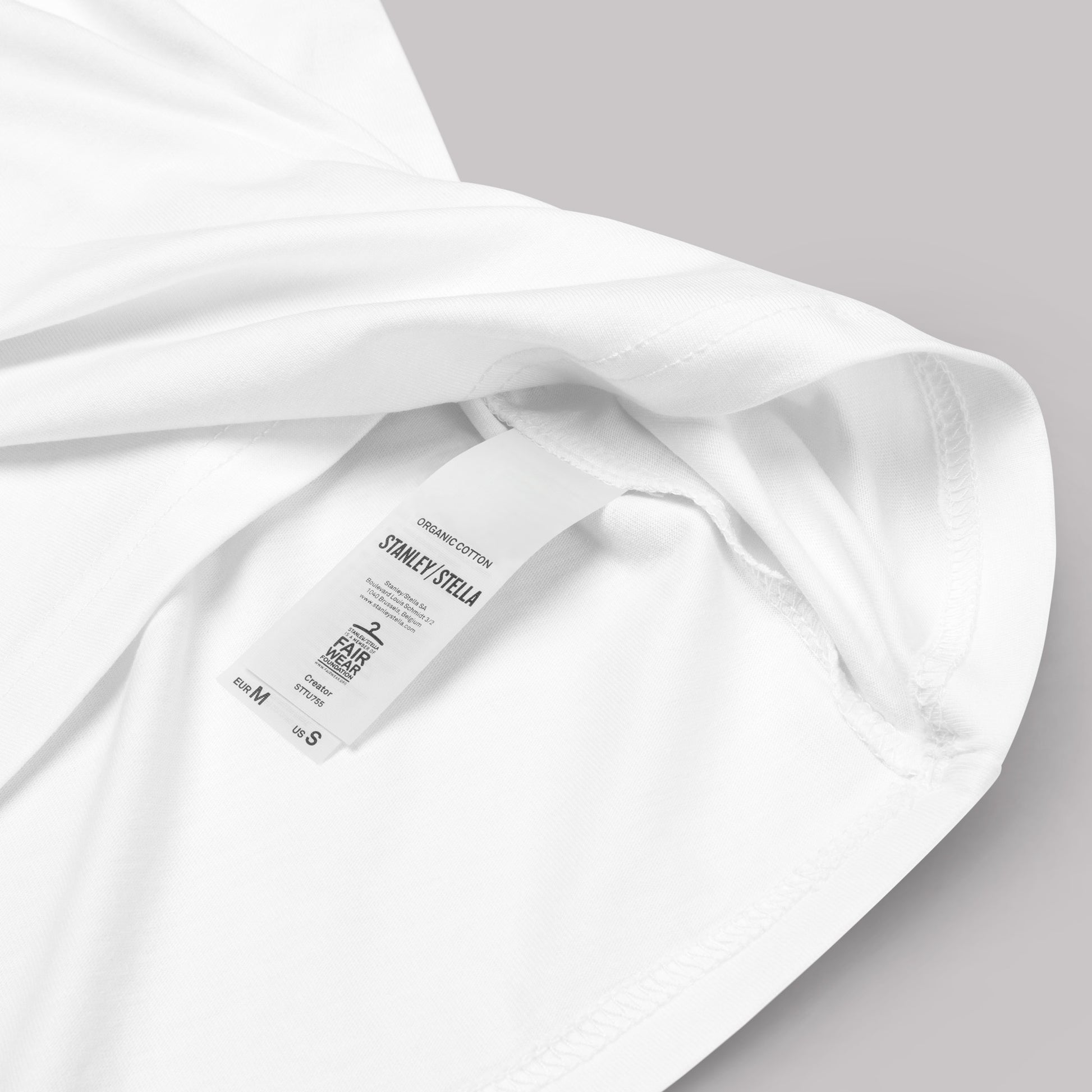 closeup of organic cotton label on Serene Equine Unisex organic cotton t-shirt