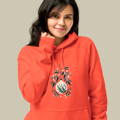 female model wearing Kimono Christmas Unisex Eco Raglan Hoodie