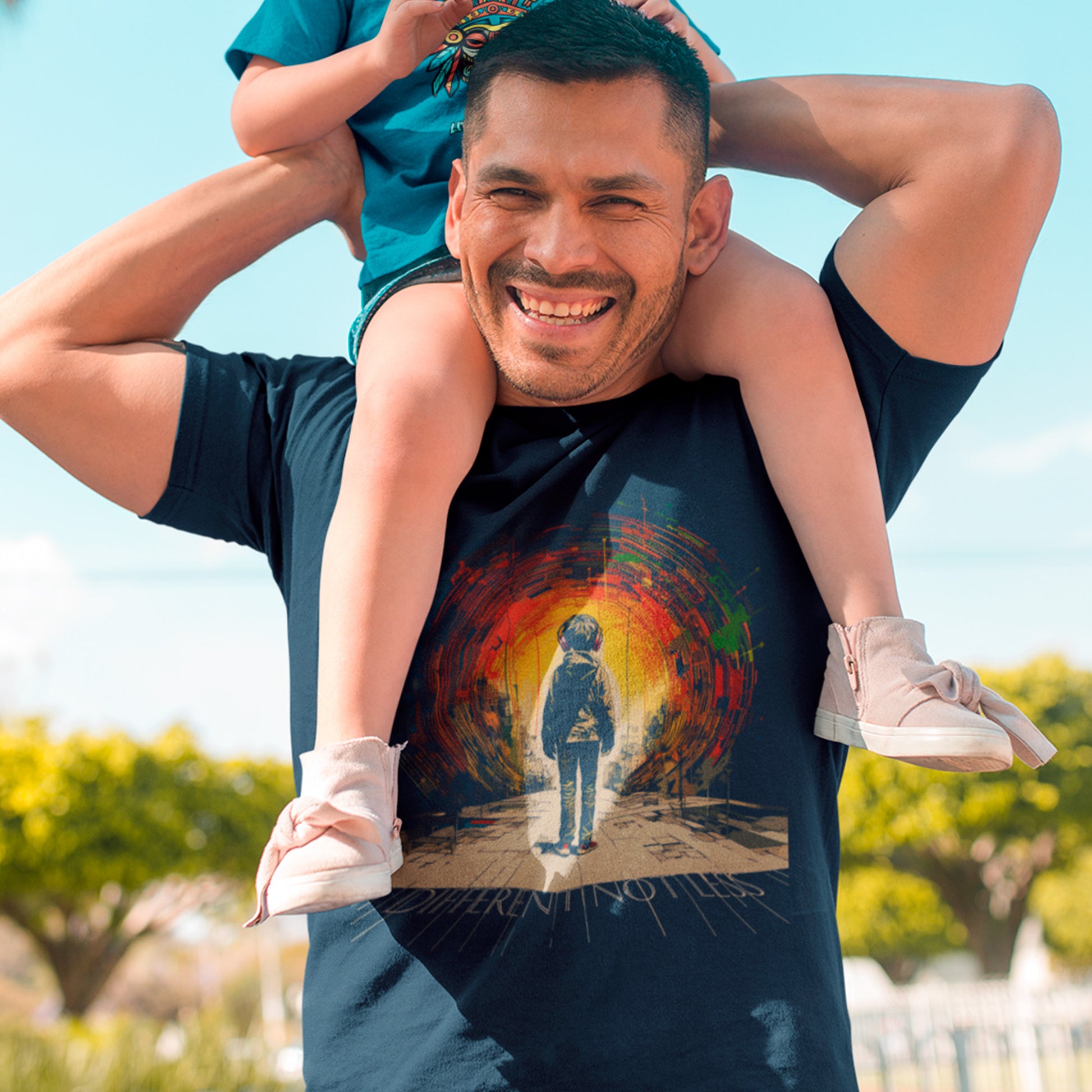 ad with child wearing a french navy Different, Not less Unisex organic cotton t-shirt