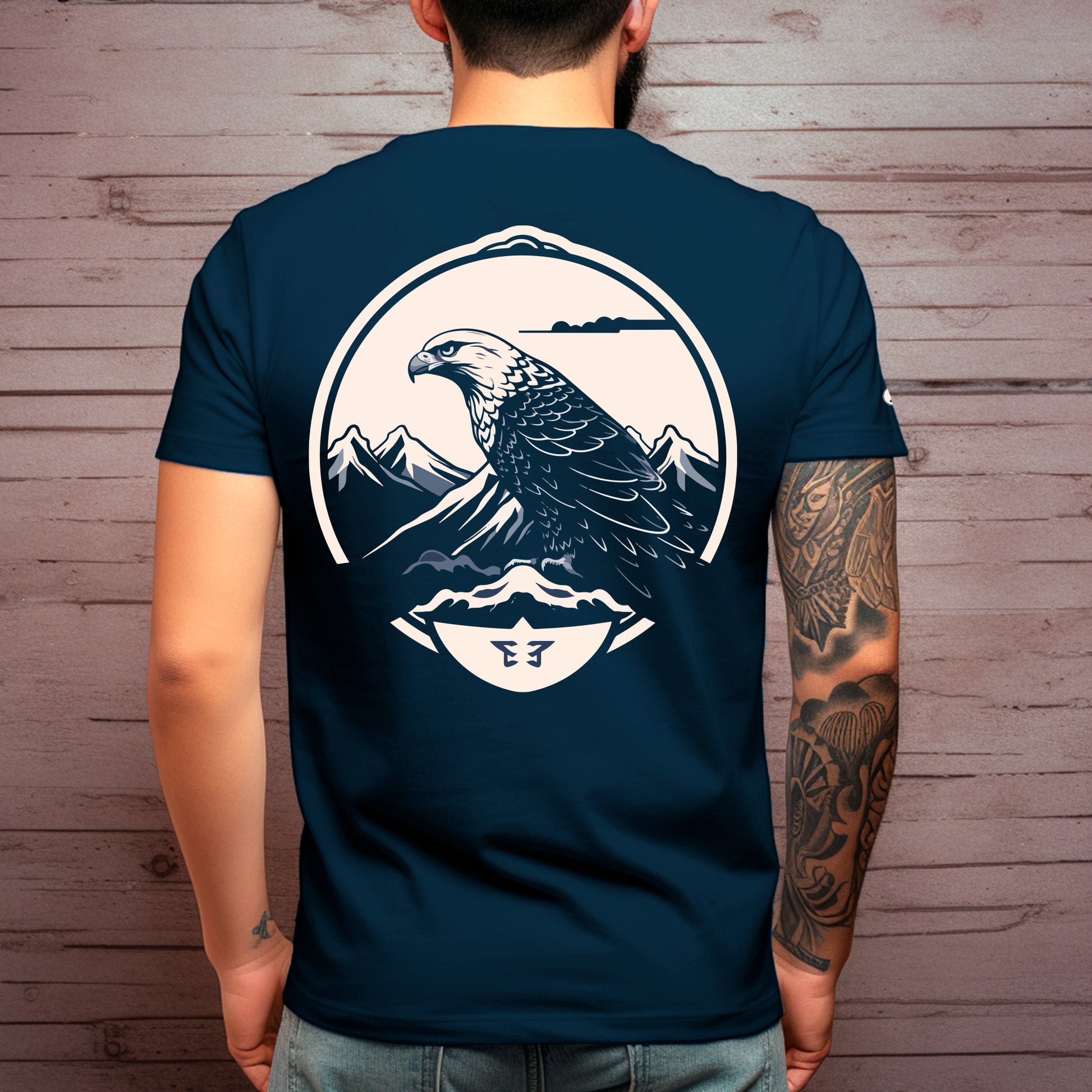 back view of  male model wearing Falcon Peak Unisex organic cotton t-shirt