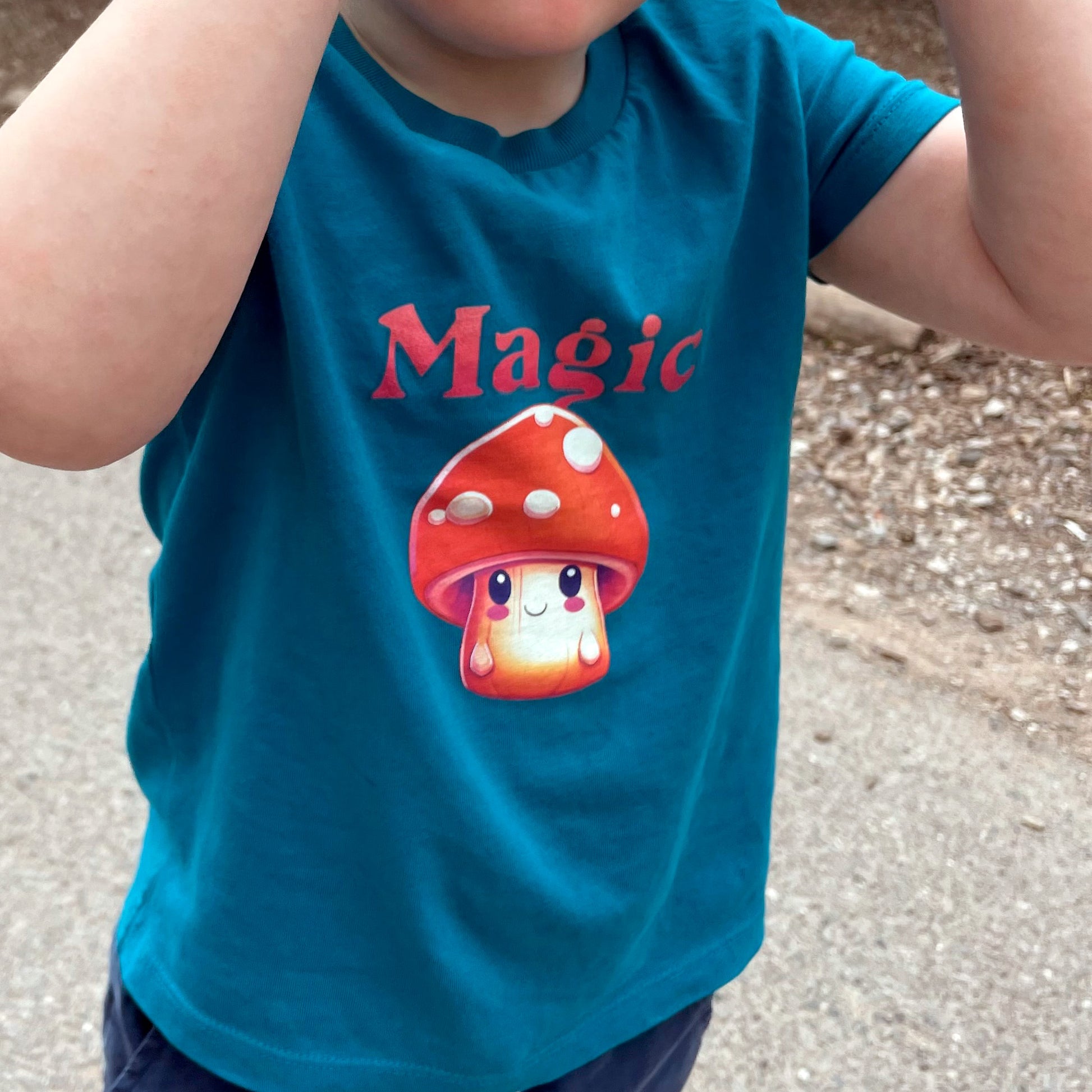 child wearing Ocean Depth- Just Magic Organic cotton kids t-shirt 