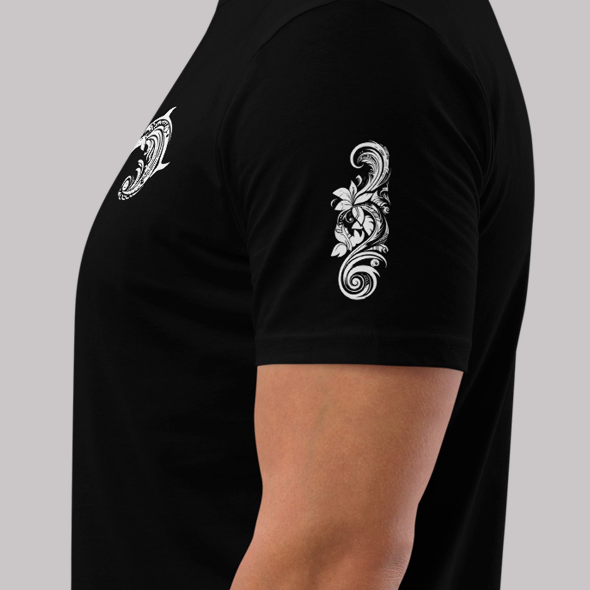 left sleeve design on a black Whakaruru Tangaroa Unisex organic cotton t-shirt
