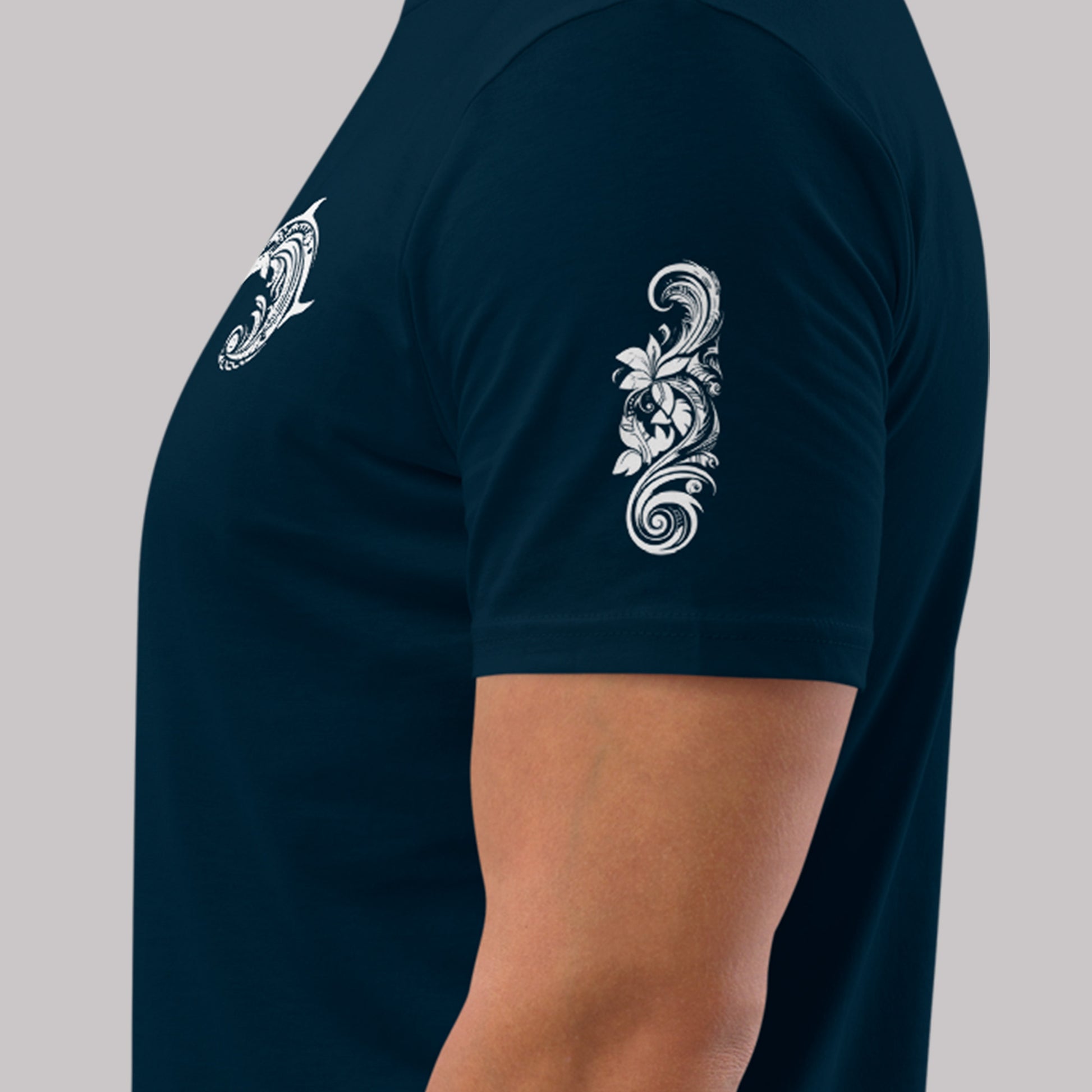 left sleeve design on a french navy Whakaruru Tangaroa Unisex organic cotton t-shirt