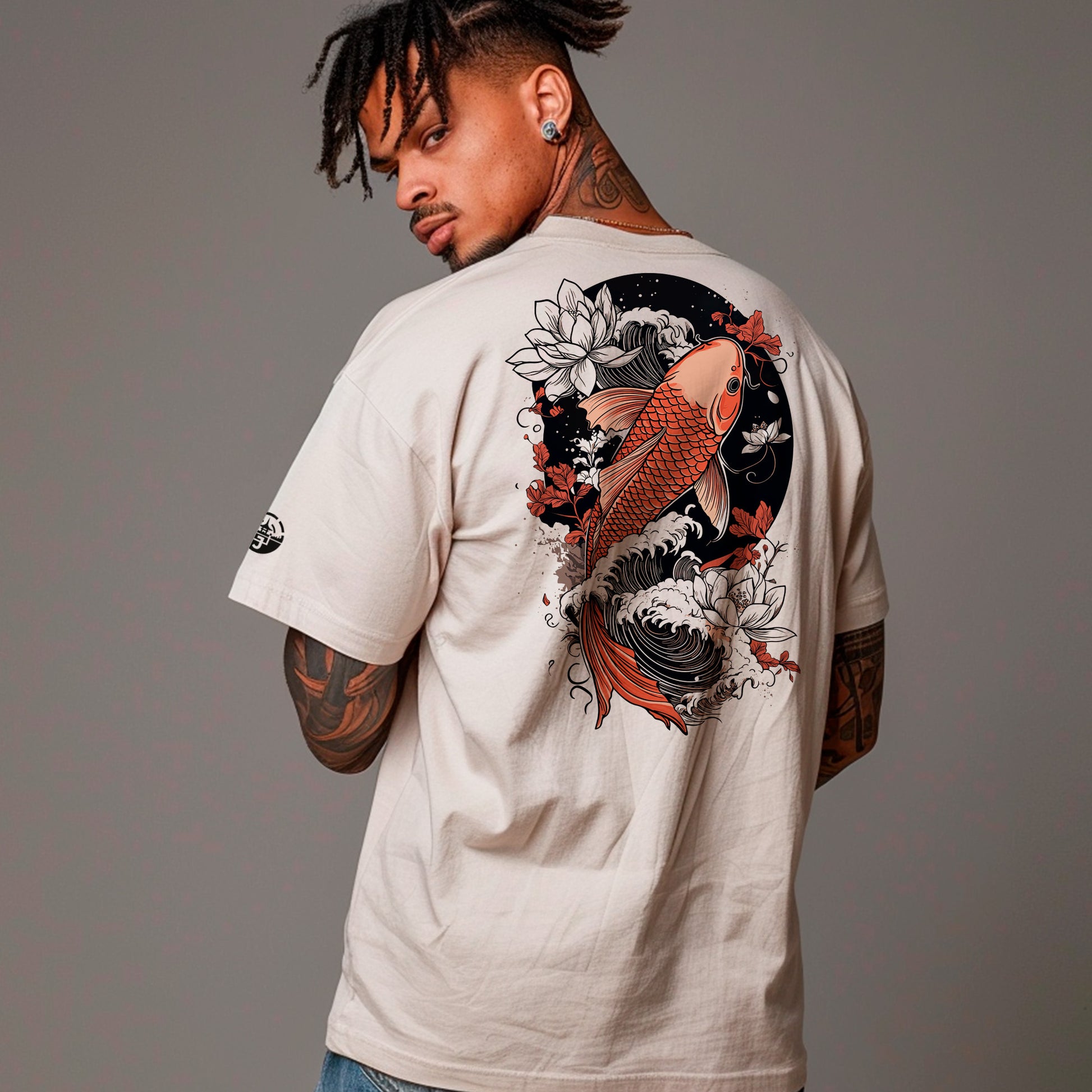 model wearing Lotus Flow Oversized faded t-shirt (back print)