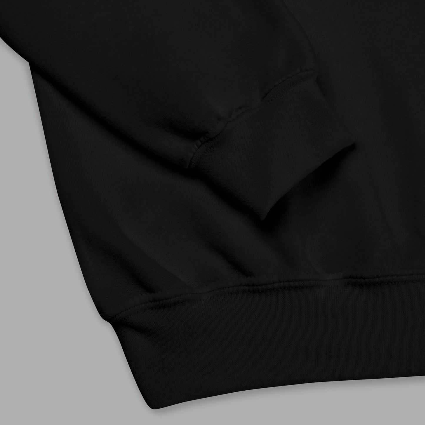 sleeve detail on black Ka Manō Embroidered Unisex Sweatshirt
