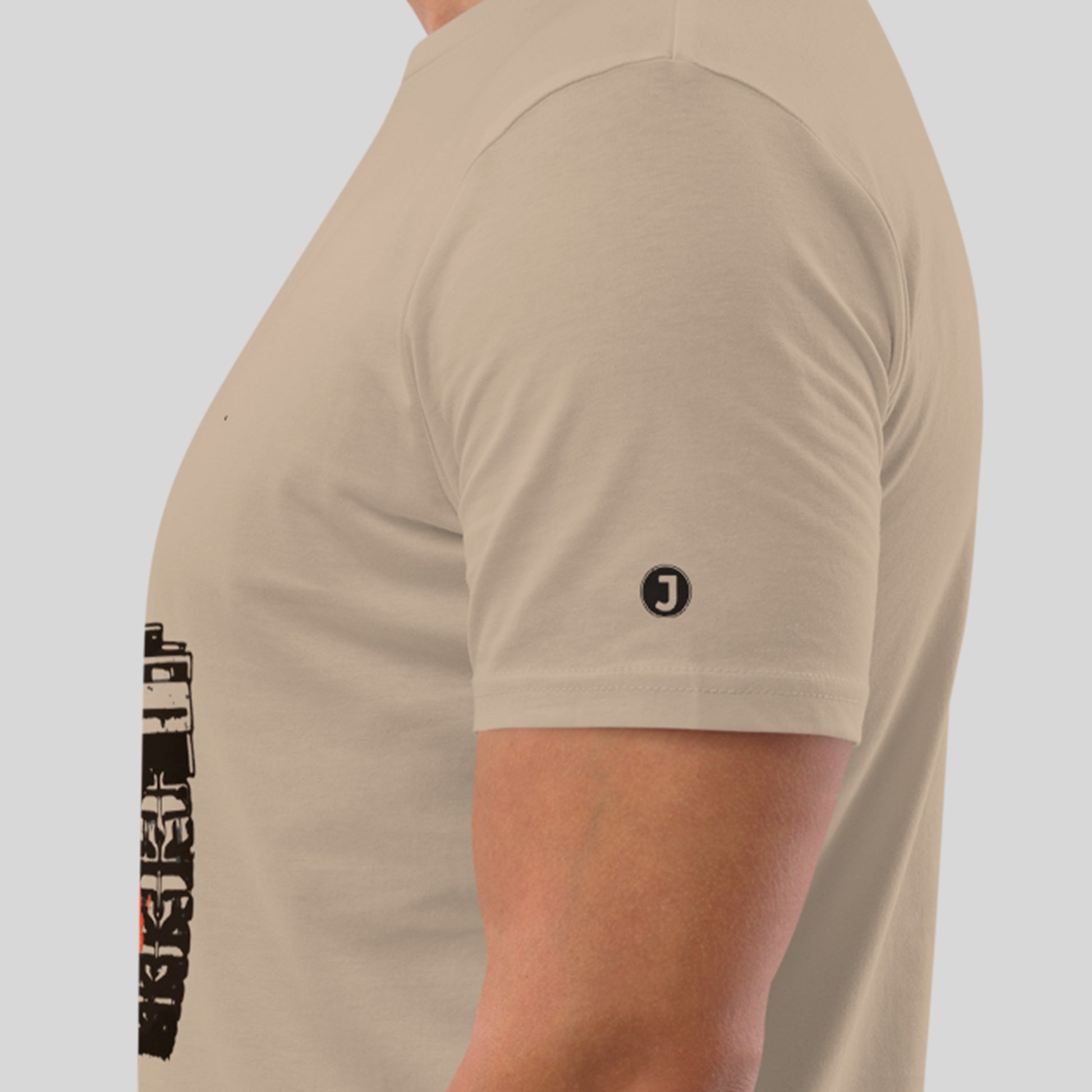 closeup of sleeve logo on desert dust The War on Wants Unisex organic cotton t-shirt