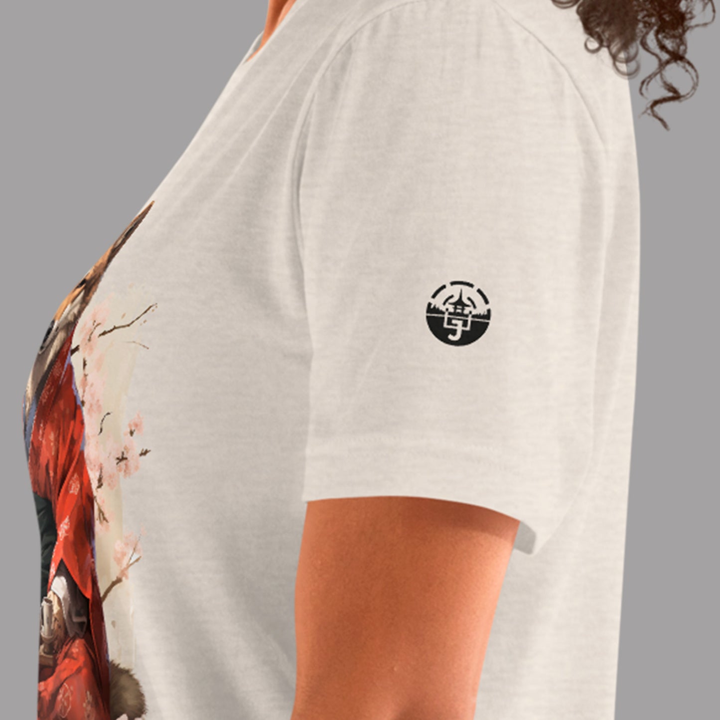 close up of logo on sleeve of heather dust Kimono Inu Unisex t-shirt