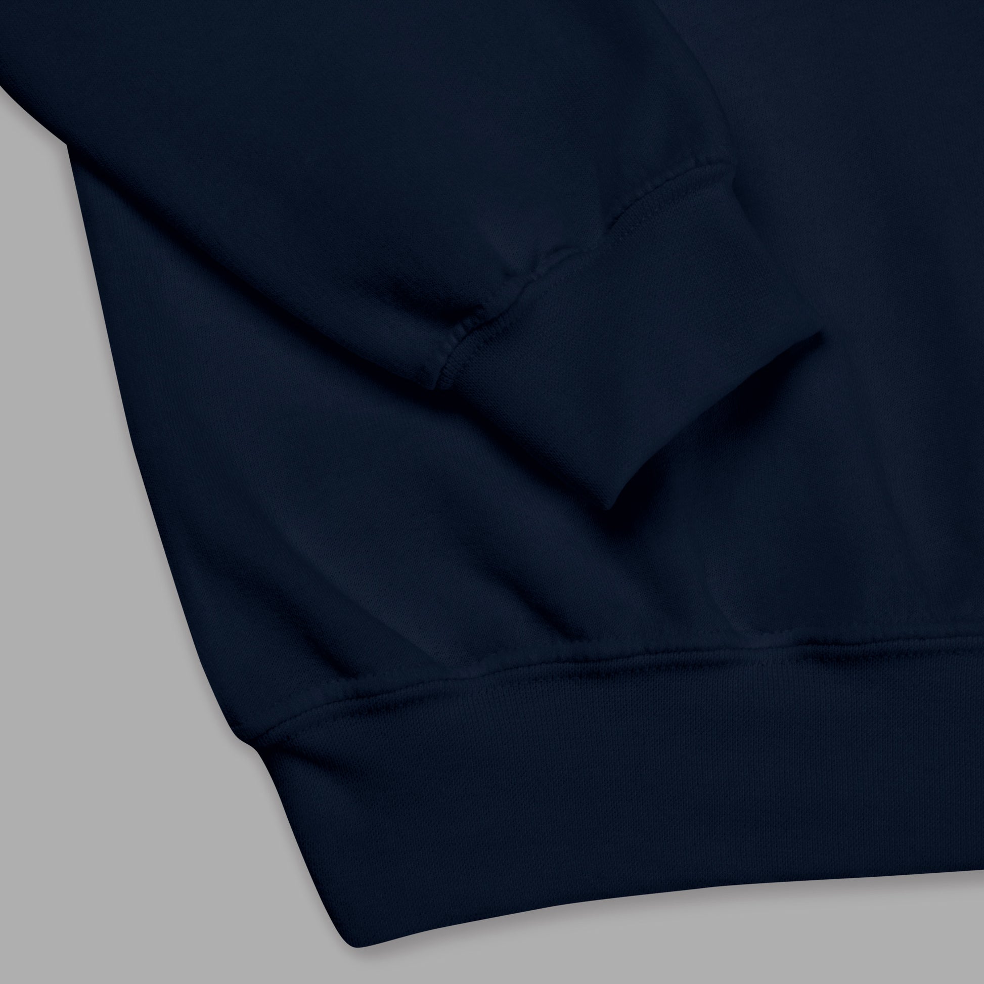sleeve detail on navy Ka Manō Embroidered Unisex Sweatshirt