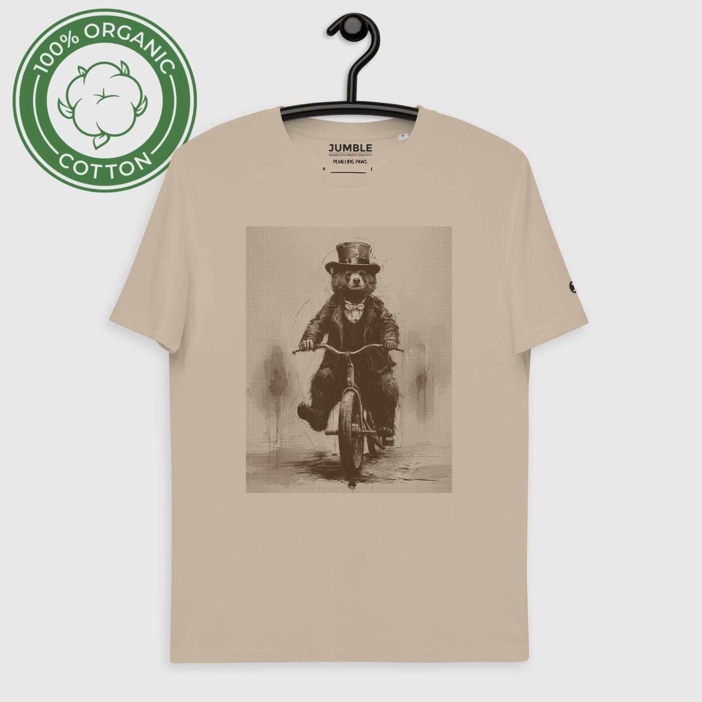 Pedalling Paws Unisex organic cotton t-shirt in desert dust colour, displayed on hanger