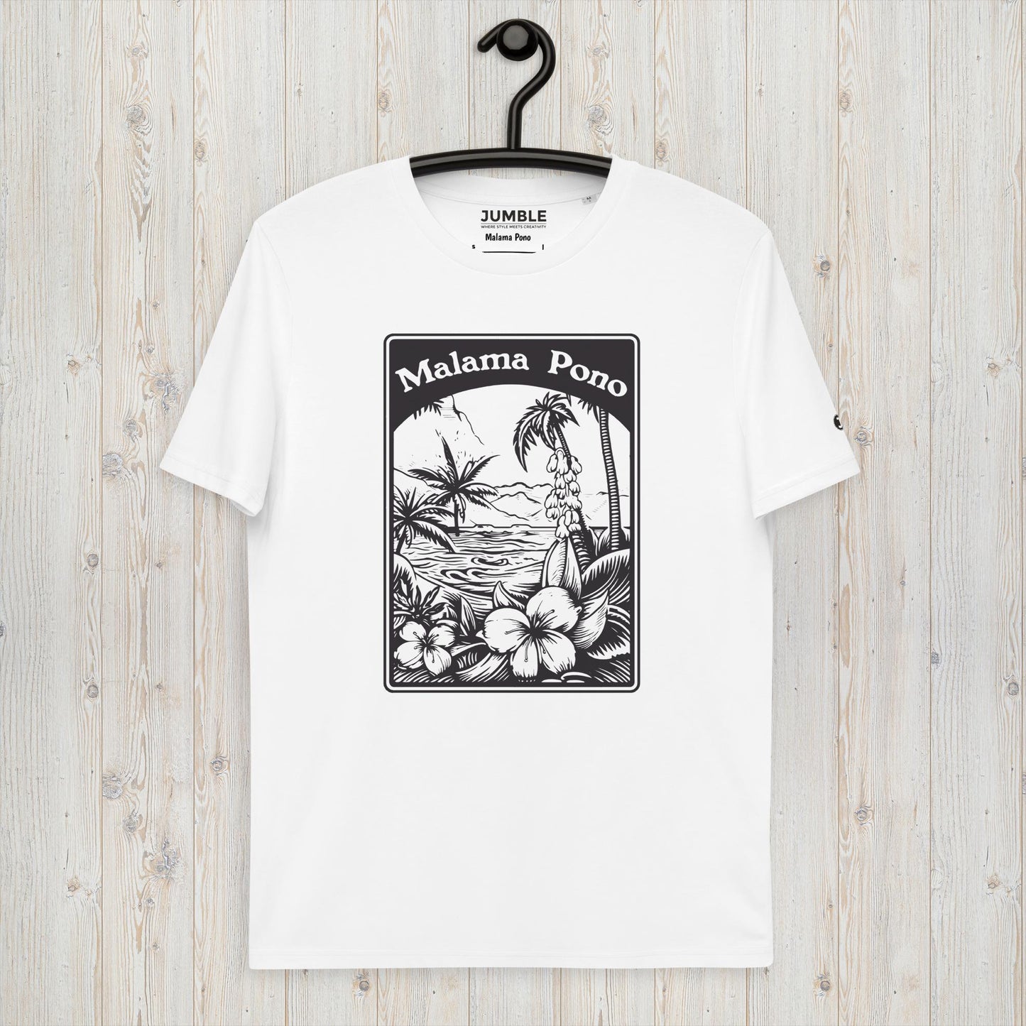 white Malama Pono Unisex organic cotton t-shirt displayed on a hanger