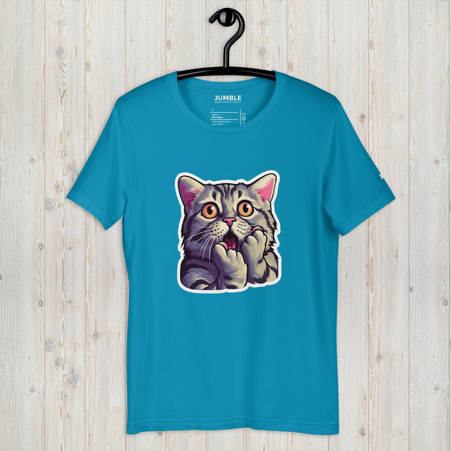 aqua Cat-astrophic Surprise Unisex t-shirt displayed on a hanger