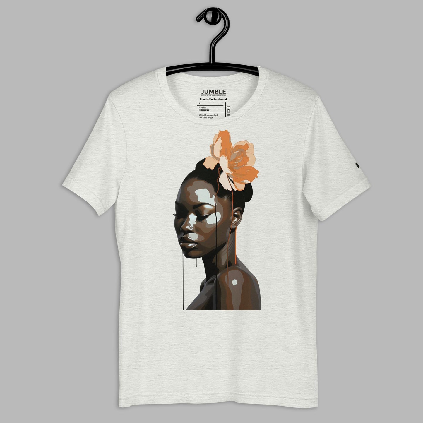 Ebonic Enchantment Unisex t-shirt, in ash. Displayed on hanger