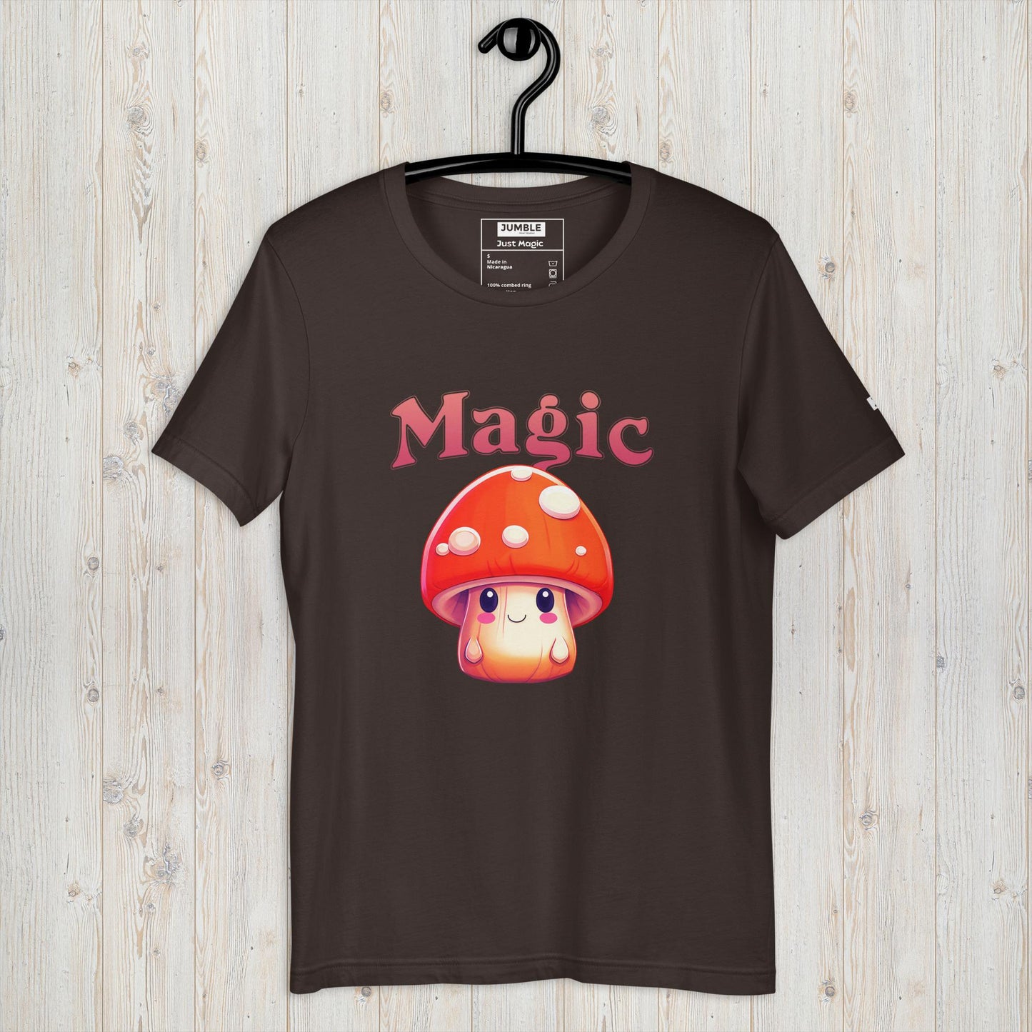brown Just Magic Unisex t-shirt displayed on a hanger