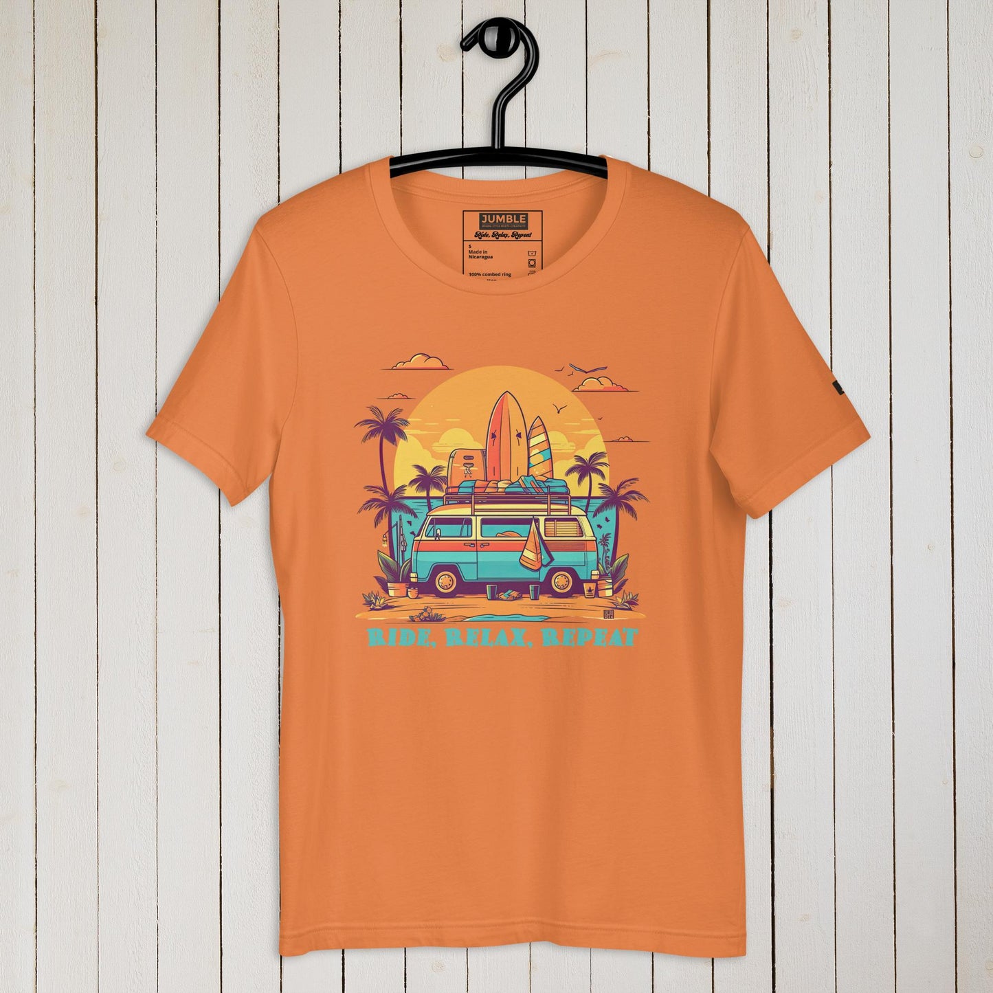 Unisex "Ride, Relax, Repeat" T-Shirt in Burnt Orange - Hanging on a hanger