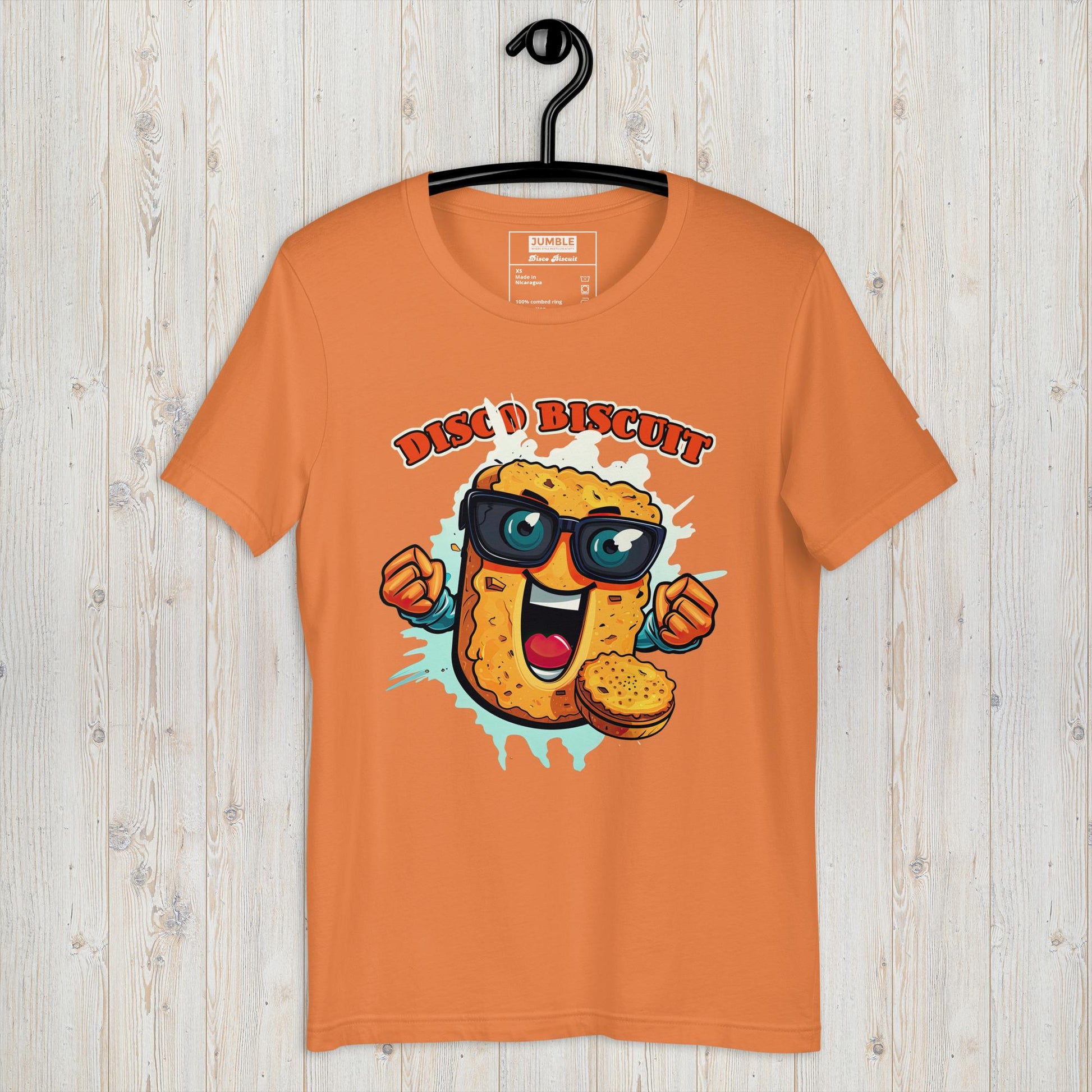 Disco Biscuit Unisex t-shirt- in orange, on hanger