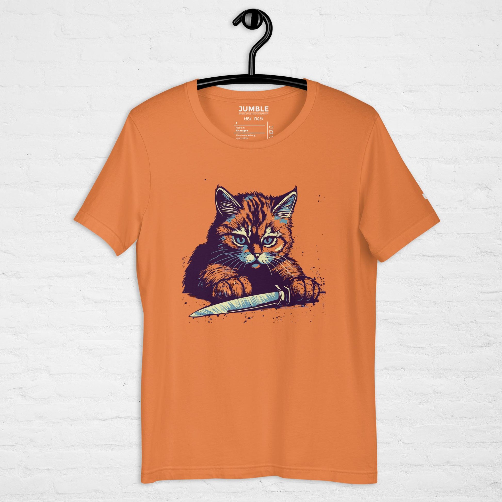 burnt orange Easy Tiger Unisex t-shirt displayed on a hanger